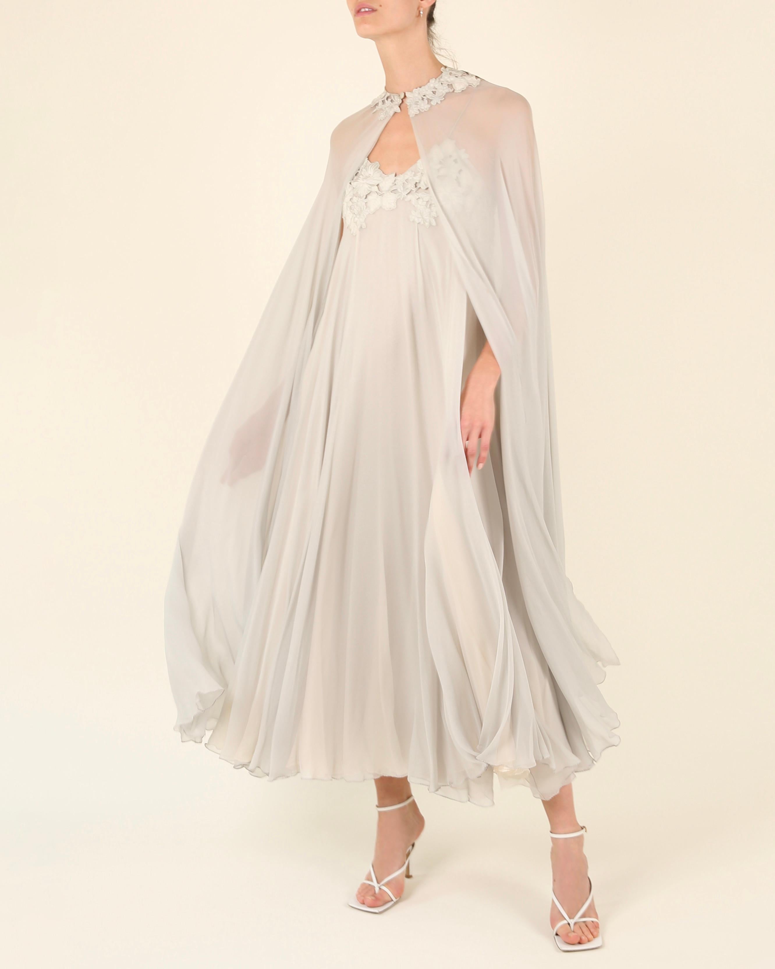 An absolutely beautifully ethereal dress in a soft blueish grey with its matching cape by George Stavropoulos dating back to the 1970's. I am lost for words at this dress, it is certainly the most beautiful I have come across so far by Stavropoulous