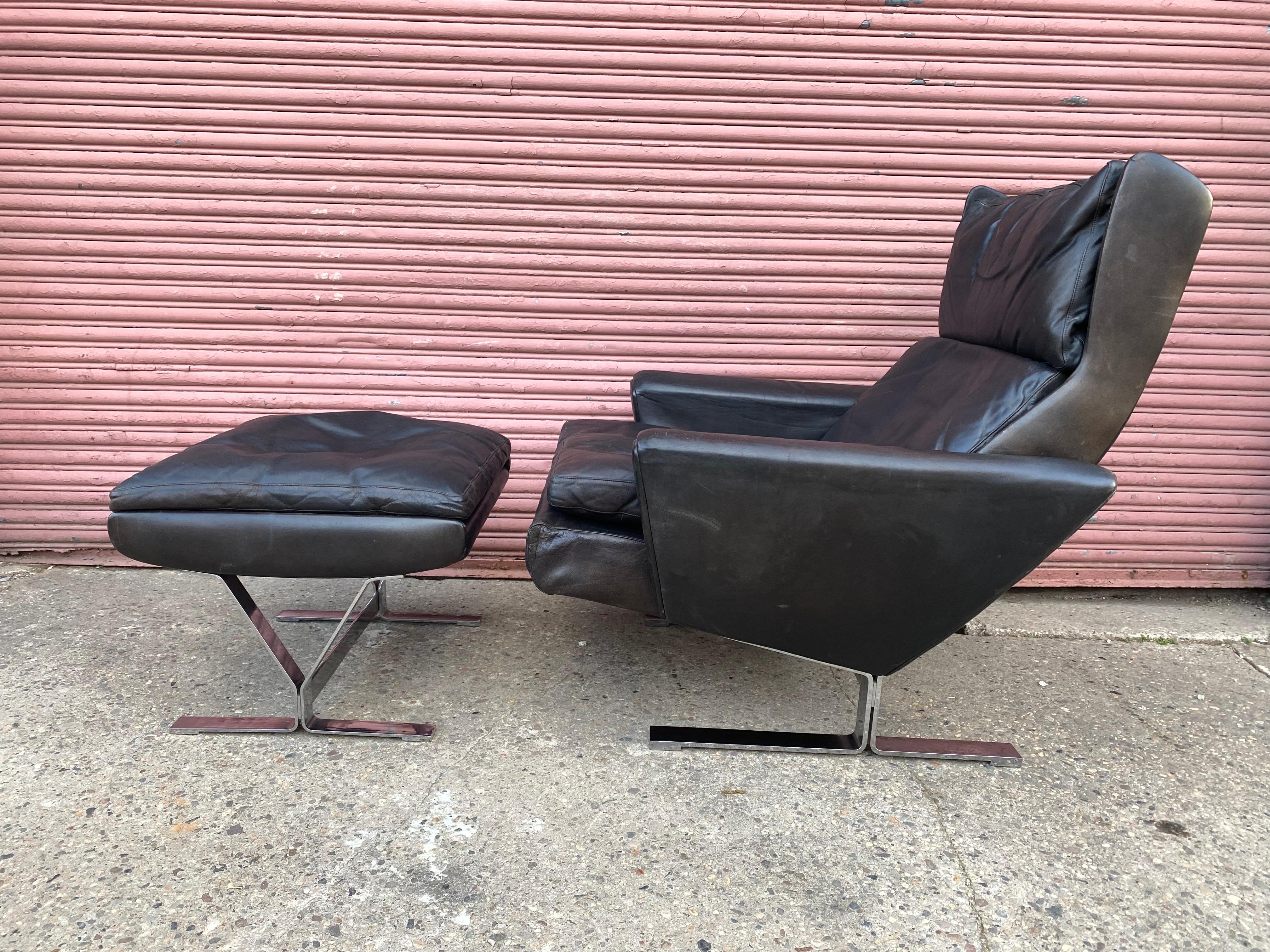 George Thams for A. S. Vejen Leather and Chrome Lounge Chair and Ottoman.  Ottoman measures 21.5 square and 17