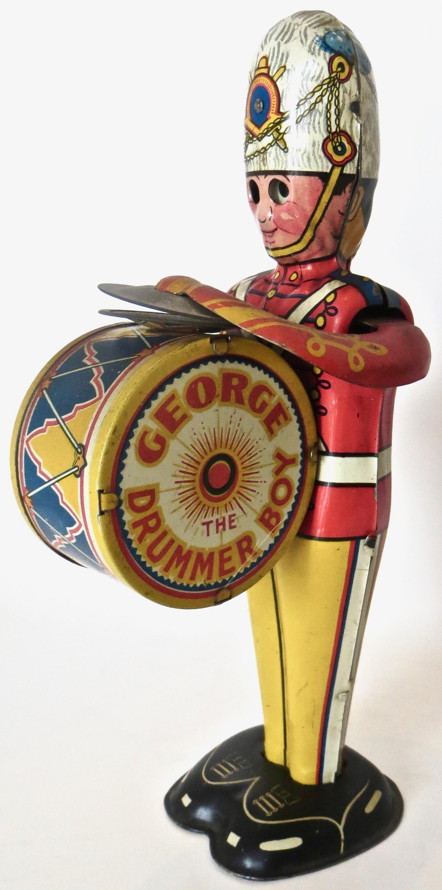 „George The Drummer Boy“ Zinn-Windup-Spielzeug von Louis Marx, New York City. Um 1930 (Volkskunst) im Angebot