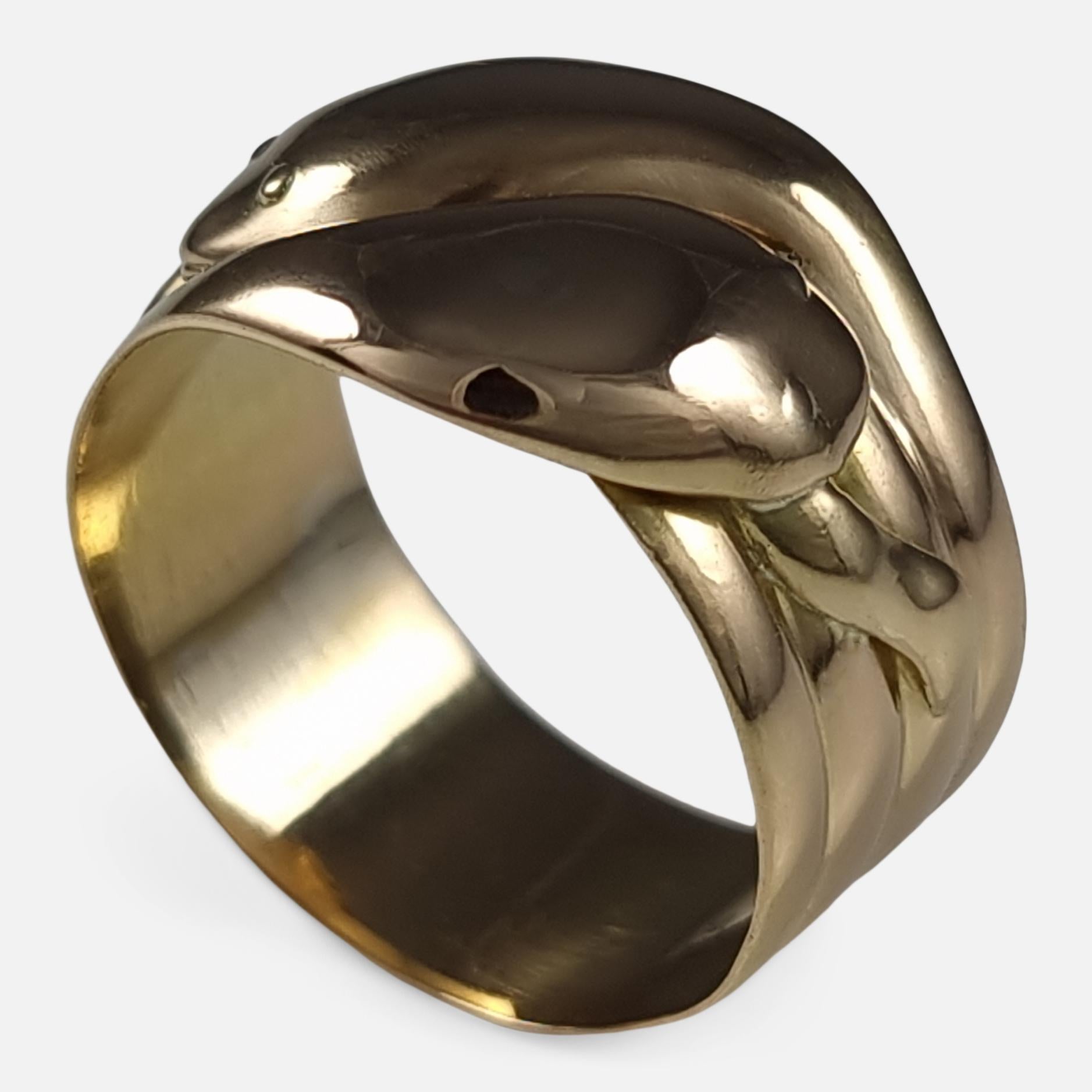 A George V era 18ct yellow gold double headed snake ring, symbolizing eternal love, marked with London hallmarks from 1917.

• Period: Early 20th Century
• Date: 1917
• Maker: J.G
• Measurement: UK ring size X (leading edge), US ring size 11 1/2