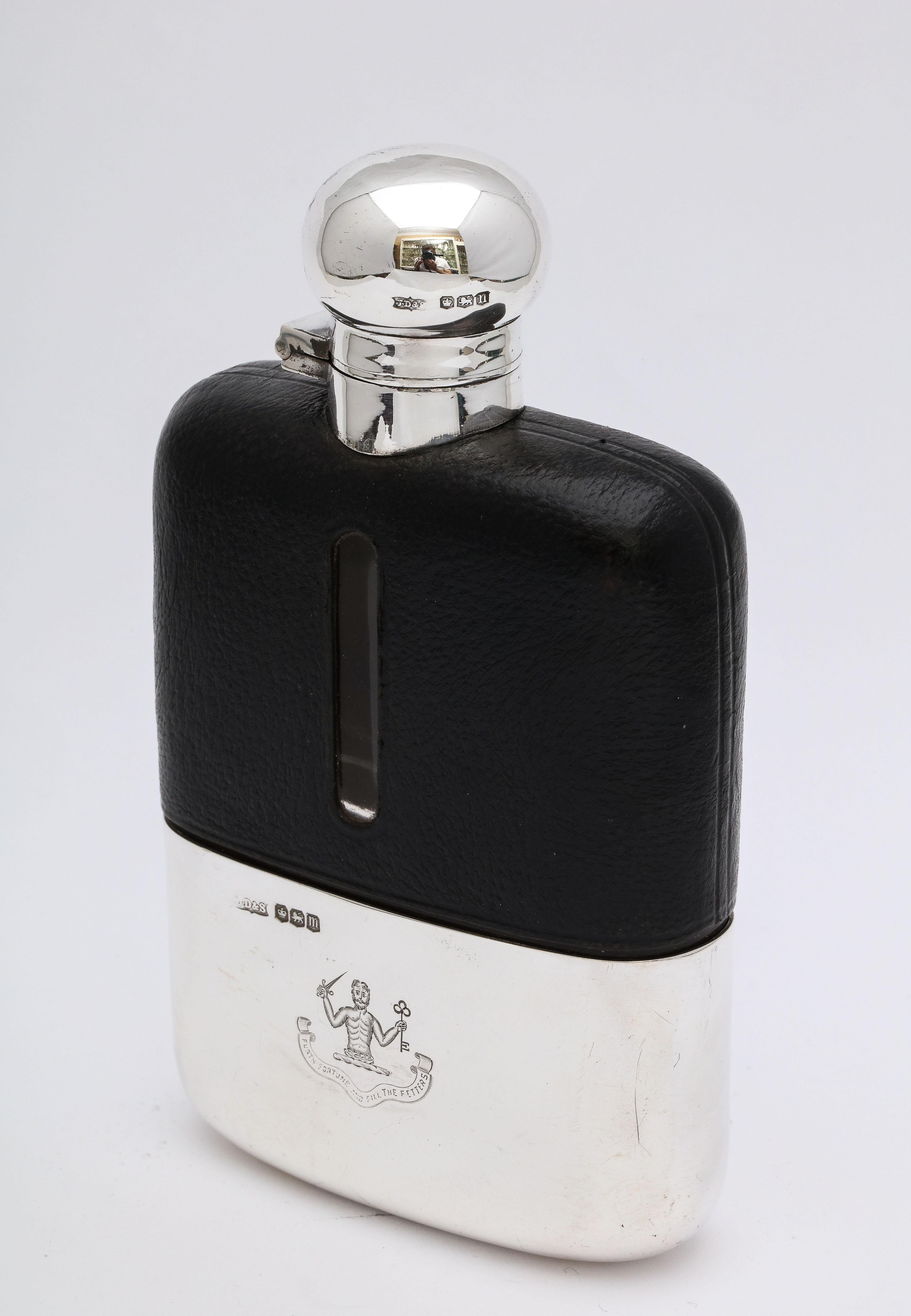 George V, sterling silver and leather-mounted glass flask, Sheffield, England, 1929, James Dixon and Sons - makers. Hand-engraved Clan Murray armorial crest, with the motto: 