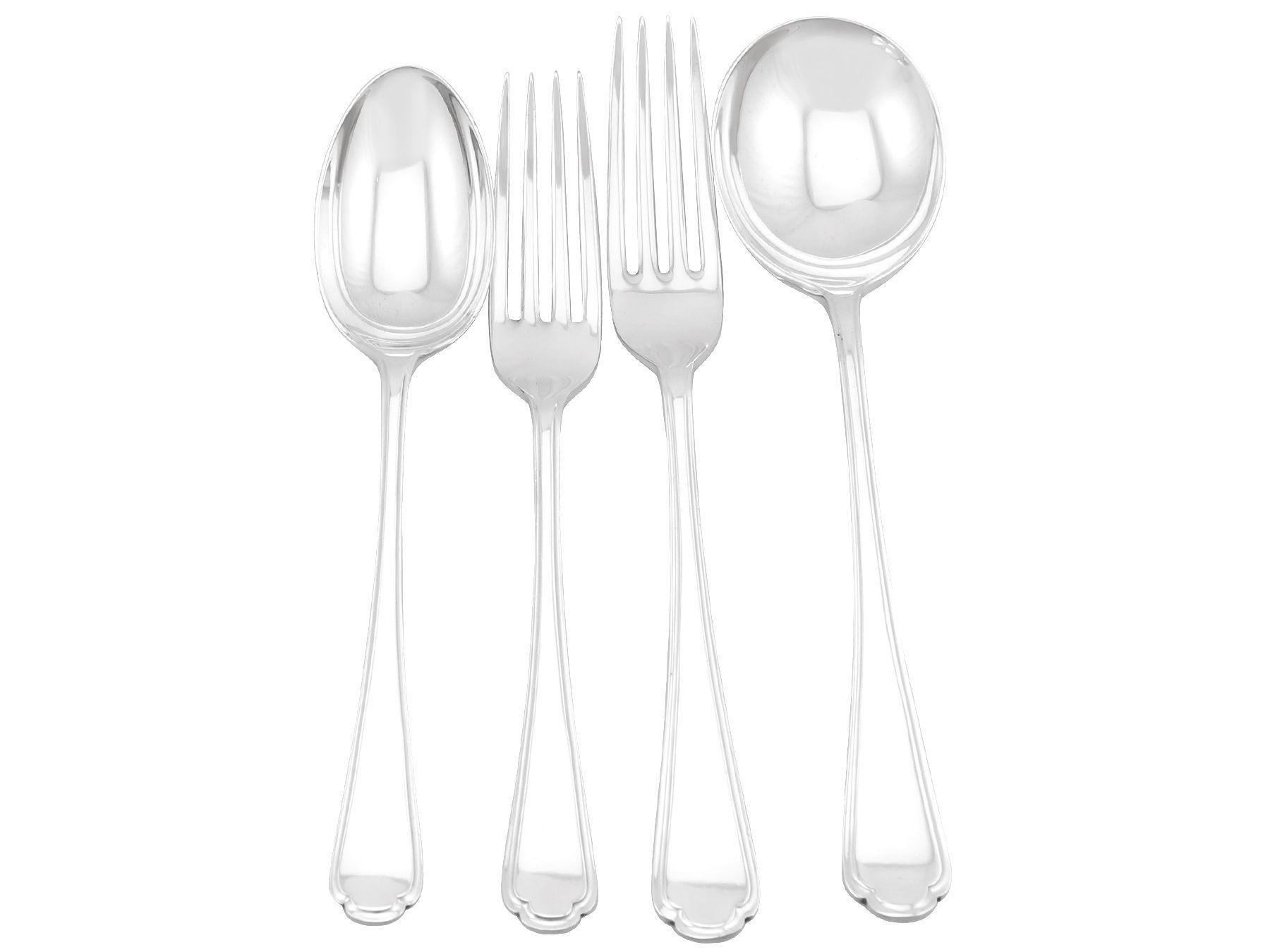 An exceptional, fine and impressive antique George V Art Deco style English sterling silver flatware service for twelve persons; an addition to our antique flatware sets.

The pieces of this exceptional antique George V Art Deco style straight*