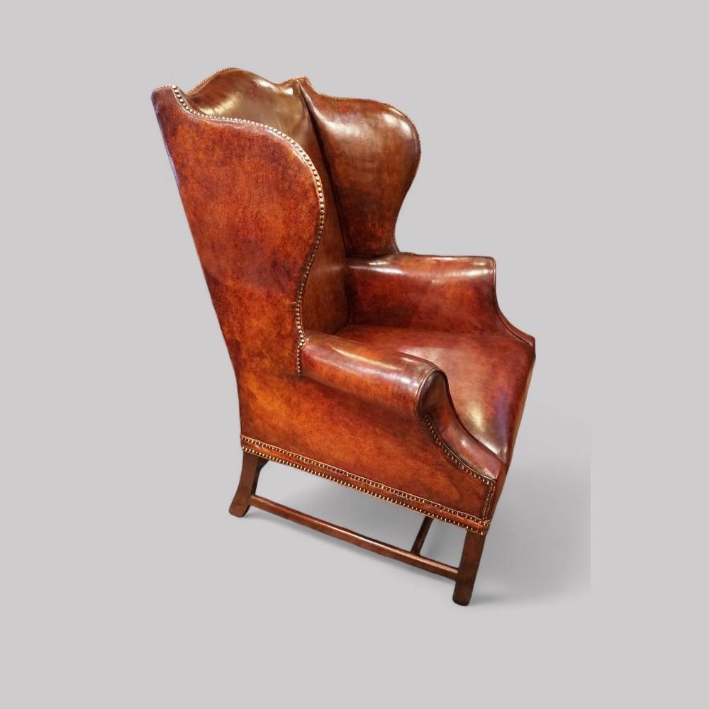 Leather George V tortoiseshell leather wing chair For Sale