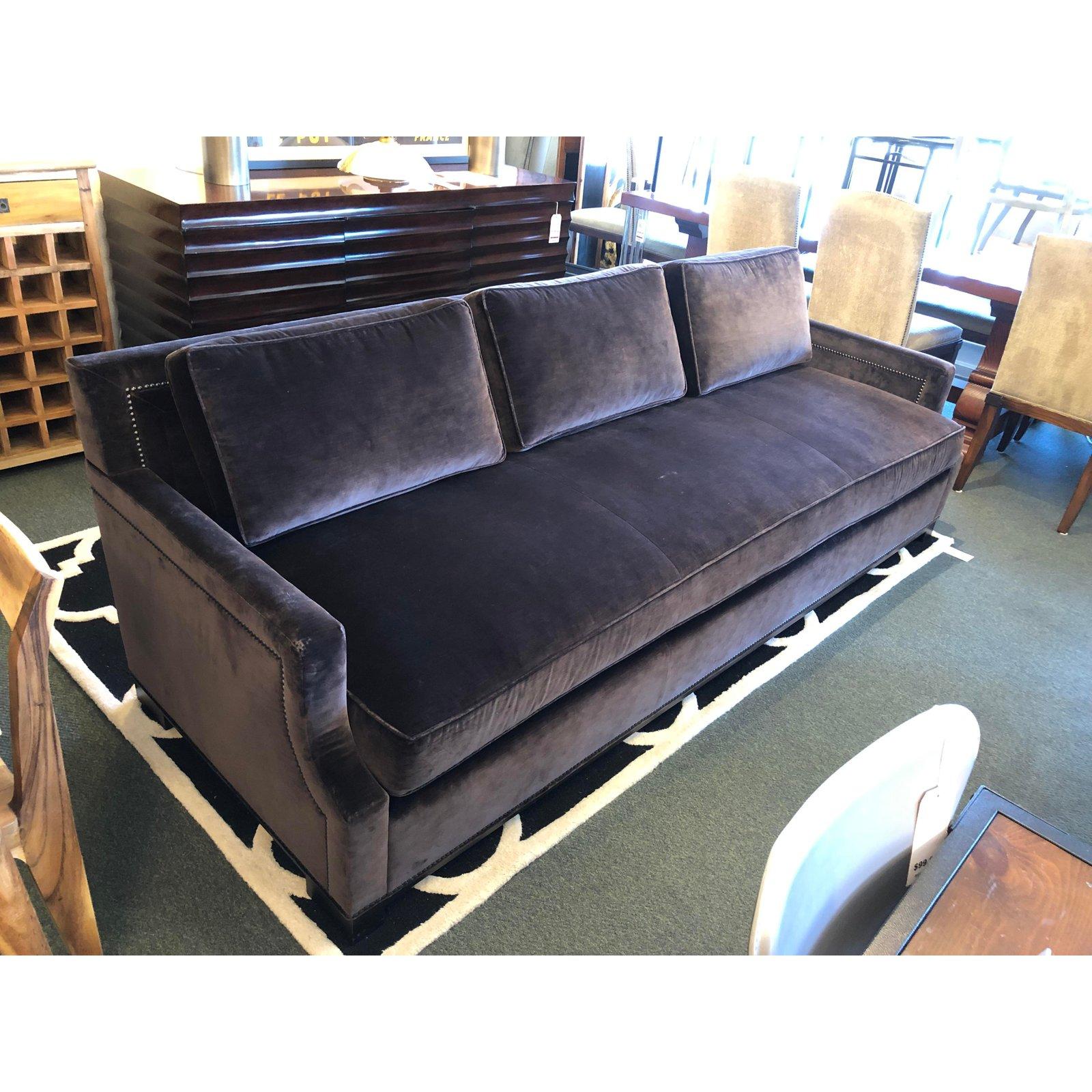 The George V sofa by Holly Hunt. Luscious bittersweet velvet and silver nailhead create an elegant streamlined sofa. Small cutout arm detail and long bench cushion with down wrapped back cushions for comfort.

Orig. Price $8,000.