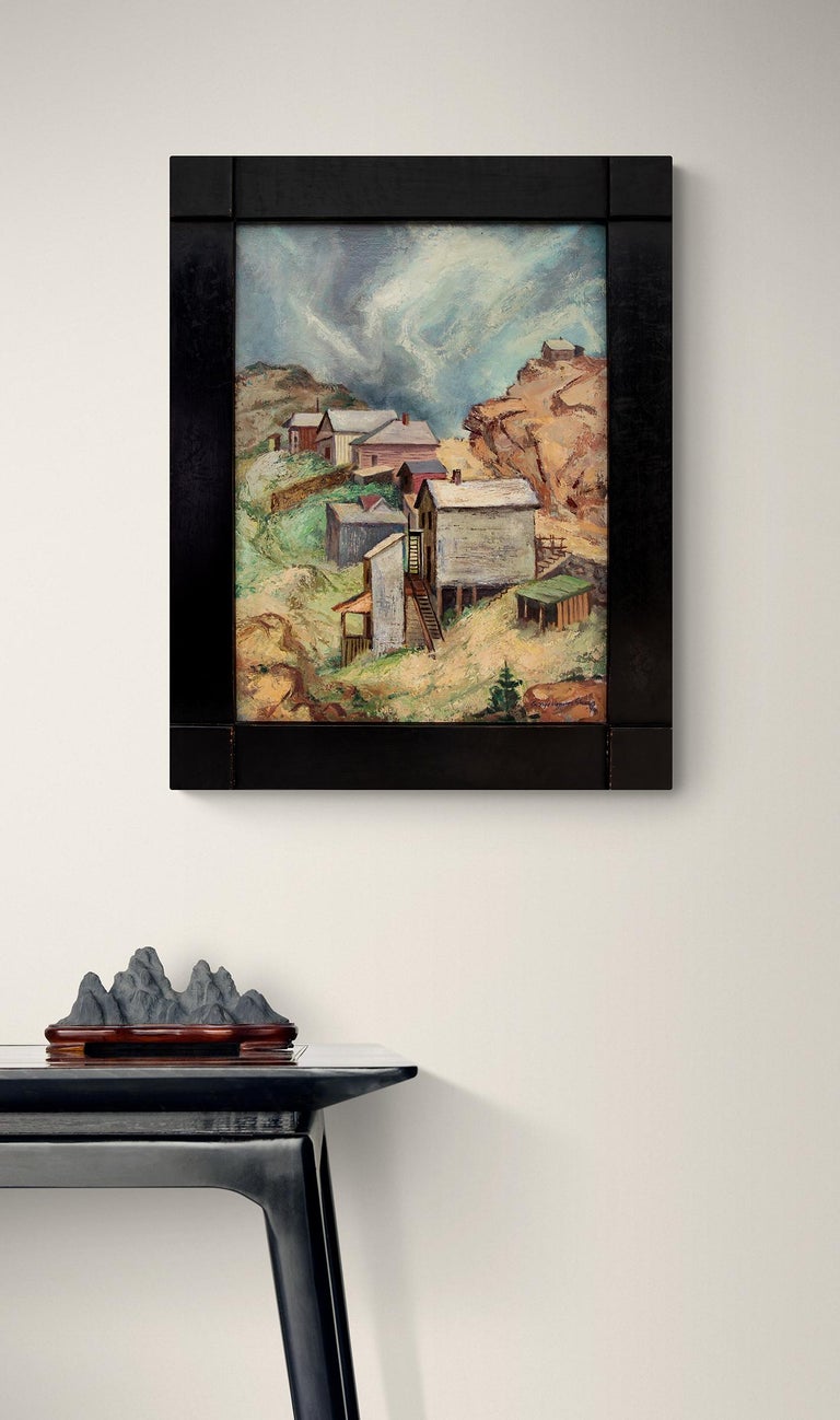 Oil on board painting by George Vander Sluis (1915-1984) titled Storm Over Victor (Colorado Mountain Town) from 1946. WPA Era Mountain Landscape with houses, trees, and clouds. Presented in a custom black frame, outer dimensions measure 29 ¼ x 23 ⅛