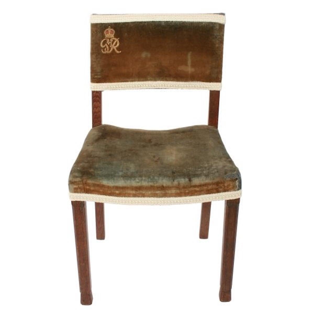 George VI oak coronation chair

A 20th century oak chair made for the coronation of George VI in 1937.

The chair was made by W Hands & Sons of High Wycombe Buckinghamshire and is stamped underneath with a crown, G R VI 1937 and the maker's