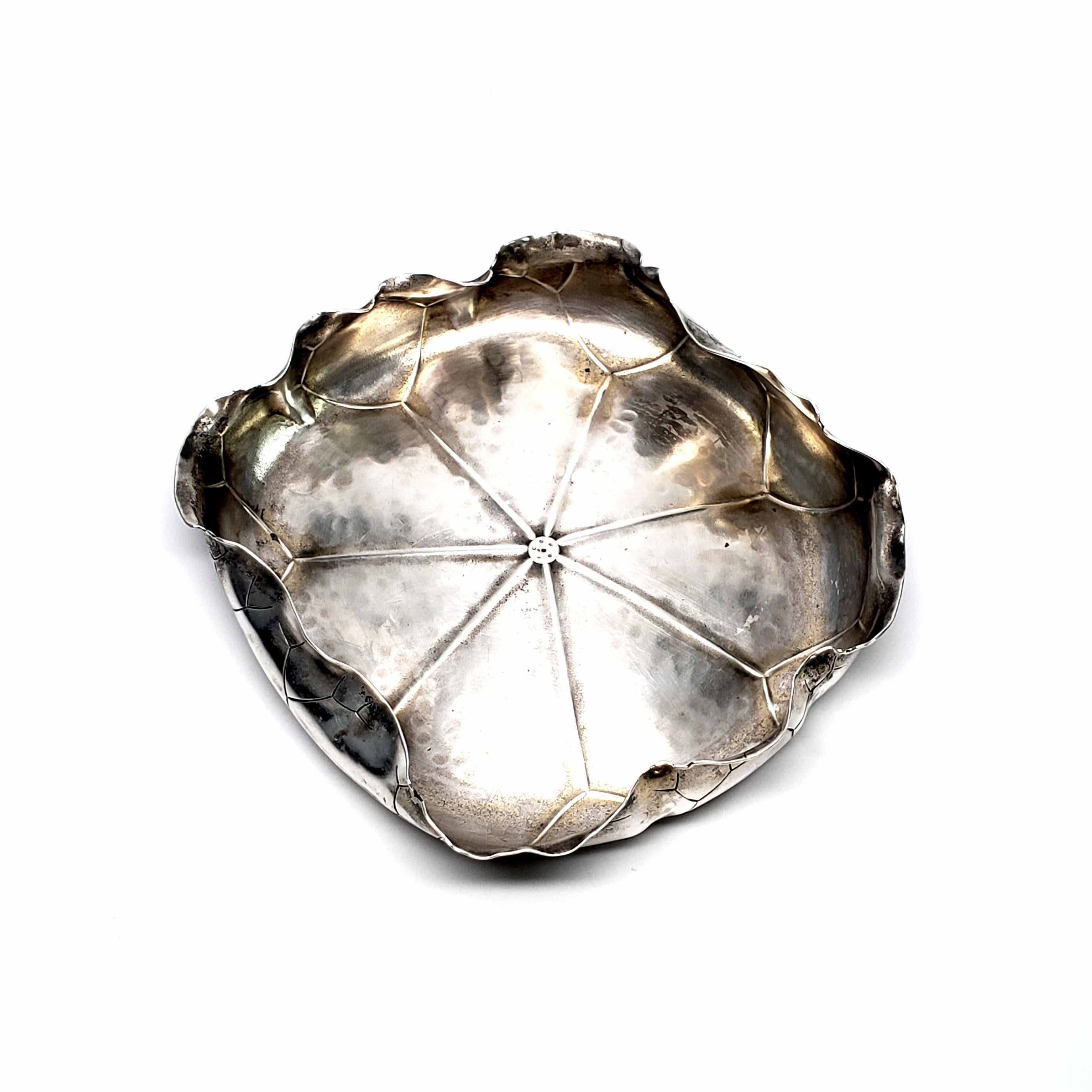 Antique sterling silver lily pad bowl George W Shiebler & Co of NY, NY, circa 1880.

This beautiful and unique hand hammered bowl features a turned up rim with asymmetrical curved edges and etched leaf veins.

Measures approx 5