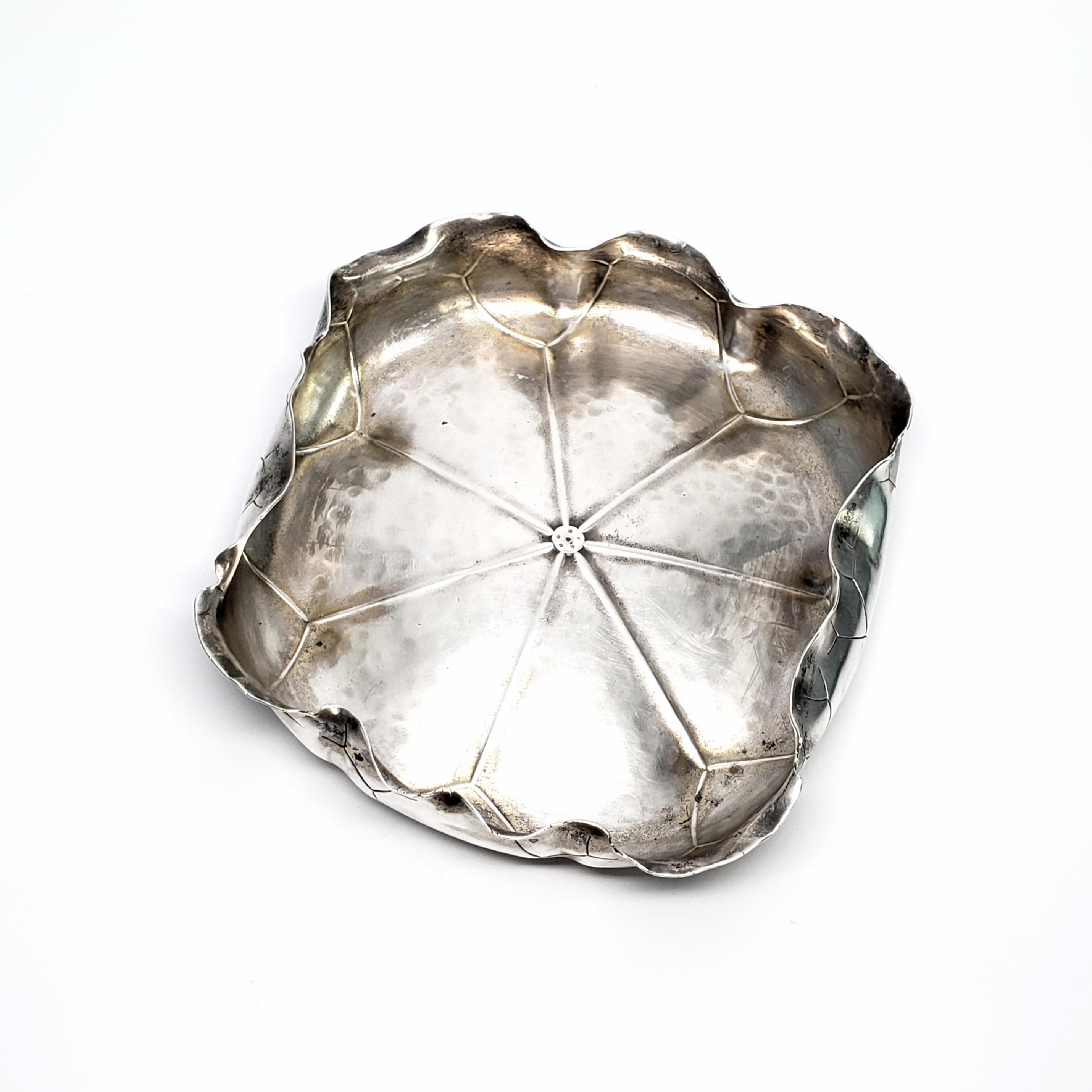 Sterling silver lily pad bowl bowl George W Shiebler & Co of NY, NY, circa 1880.

This beautiful and unique hand hammered bowl features a turned up rim with asymmetrical curved edges and etched leaf veins.

Measures approx 5