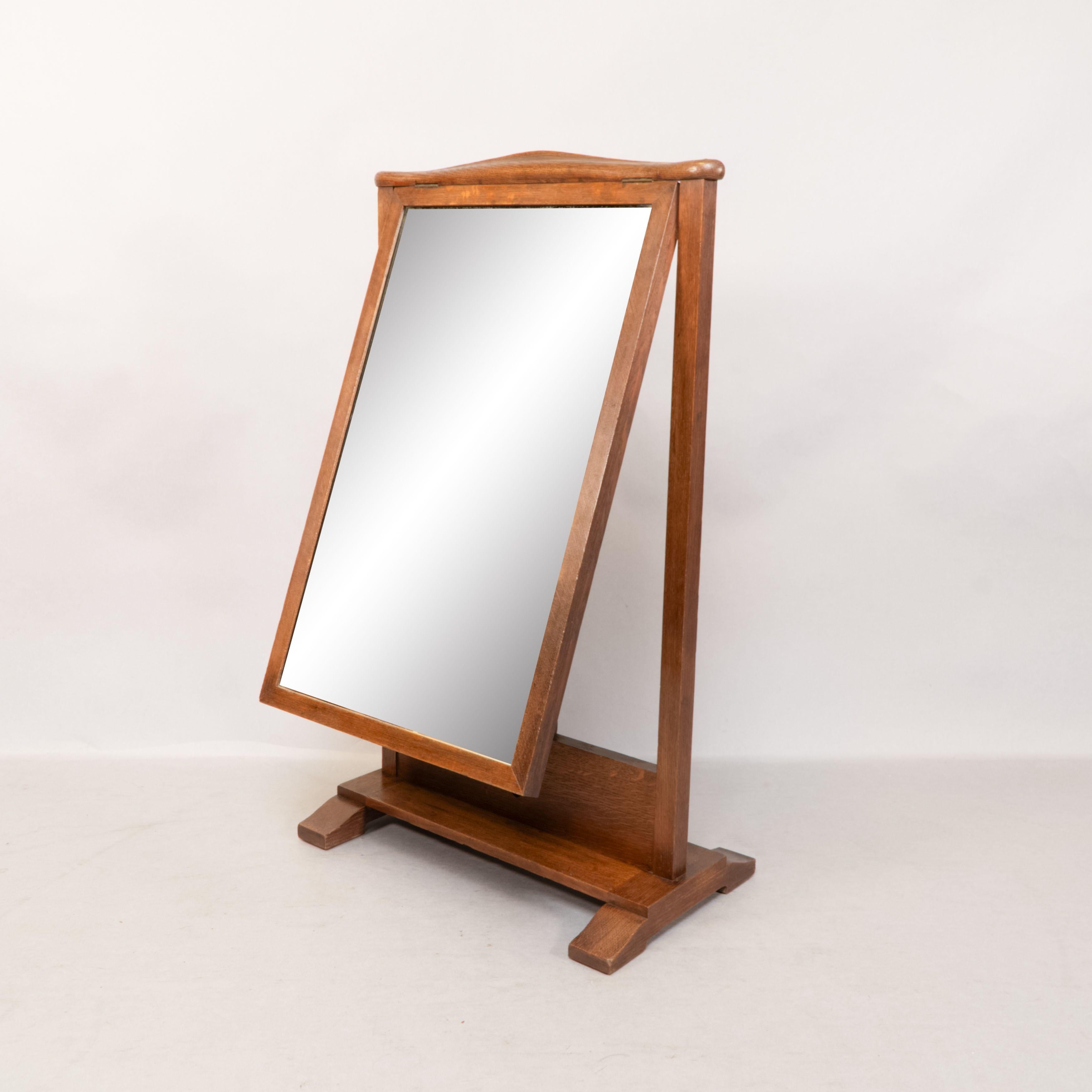 British George Walton. An Arts and Crafts oak dressing table mirror For Sale