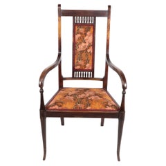 George Walton for John Rowntree's cafe. An Arts and Crafts walnut armchair