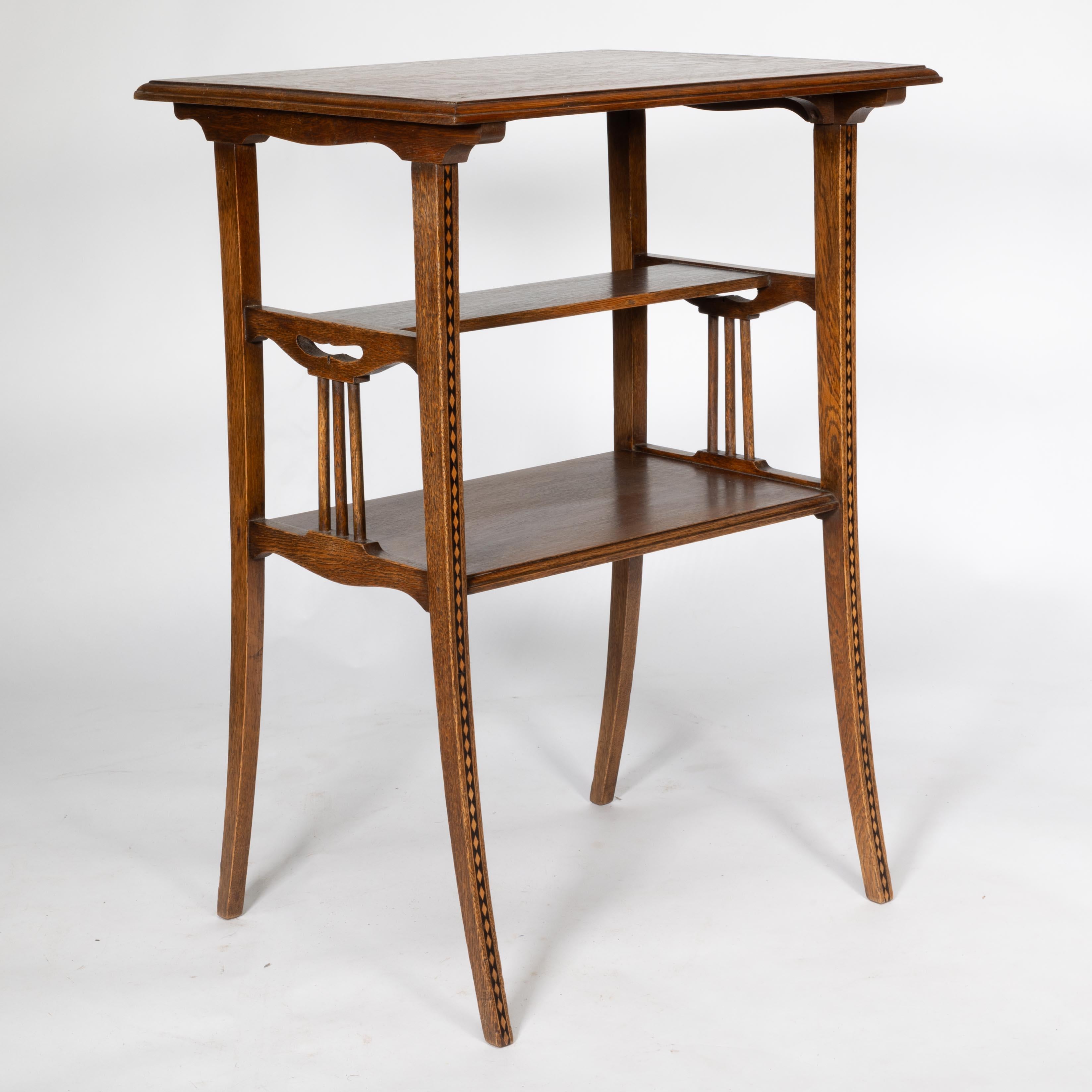 Late 19th Century George Walton style of. A pair of Arts & Crafts inlaid oak side table
