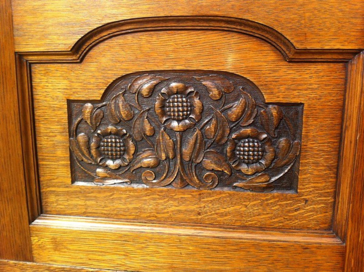 Arts and Crafts George Walton Style of a Small Arts & Crafts Oak Sideboard with Floral Carvings For Sale