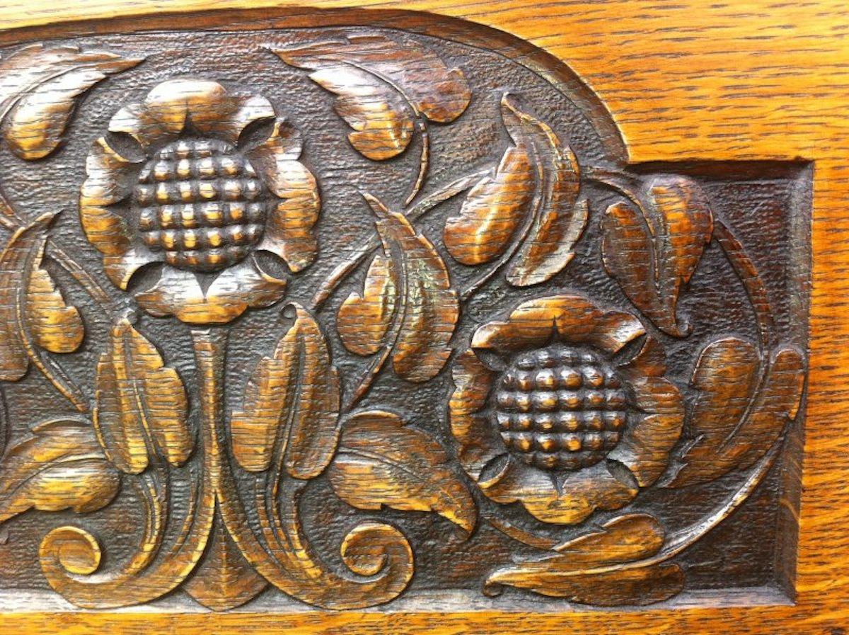 English George Walton Style of a Small Arts & Crafts Oak Sideboard with Floral Carvings For Sale