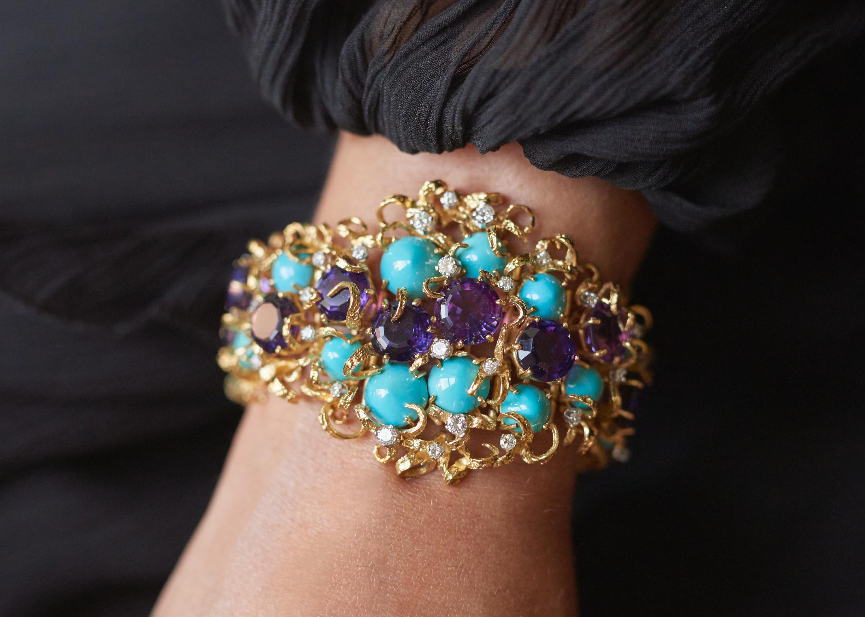 A faceted amethyst, cabochon turquoise, diamond, 18 karat gold, and platinum bracelet, by George Weil, c. 1960. 

The bracelet is stamped G. Weil, Plat, 18CT. It is 7