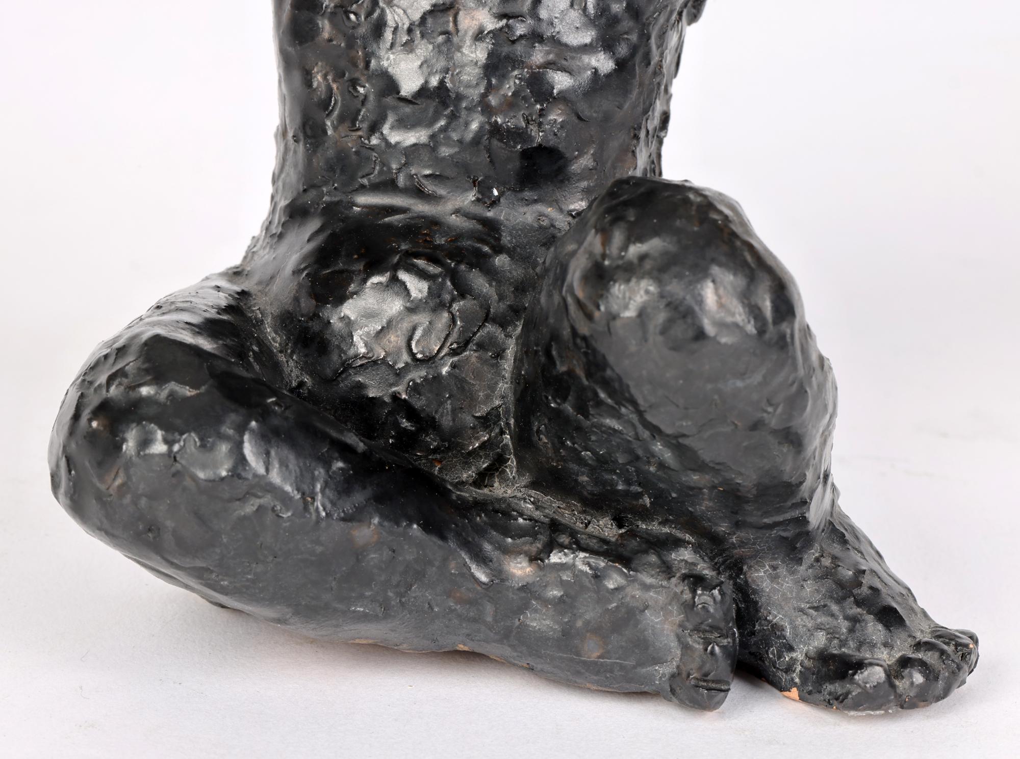 Mid-Century Modern George West Studio Pottery Black Glazed Seated Child Sculpture Dated 1969 For Sale