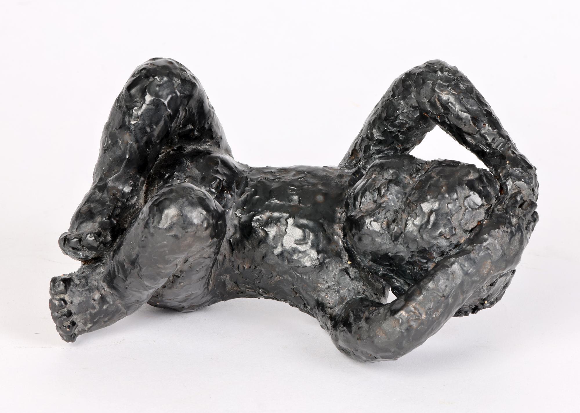 Mid-20th Century George West Studio Pottery Black Glazed Seated Child Sculpture Dated 1969 For Sale