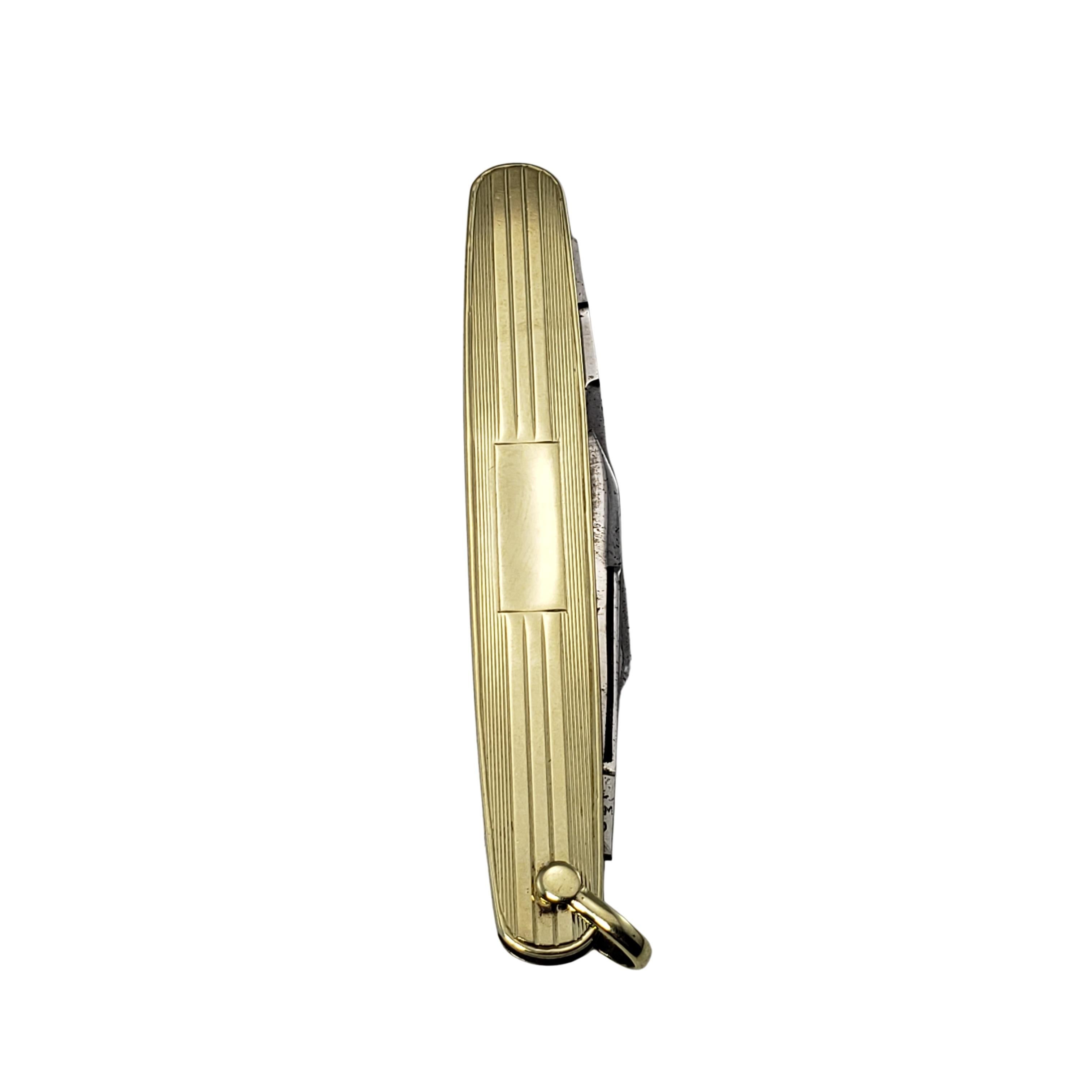 14 Karat Yellow Gold and Stainless Steel Pocket Knife-

This elegant pocket knife features two stainless steel blades house in beautifully detailed 14K yellow gold.  Polished bar on case for monogram.

Size: 66 mm x 11 mm

Weight:  10.8 dwt. /  16.9