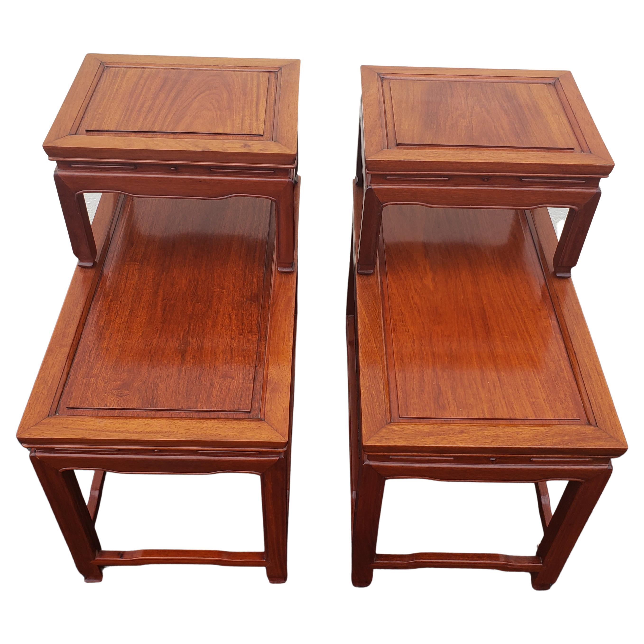 For your consideration is this fabulous pair of vintage Rosewood carved end tables, by George Zee.
 Stacked Ming style Chinese nightstands / end tables - hand crafted with kiln dried solid Rosewood.
Very well proportioned, great for smaller spaces