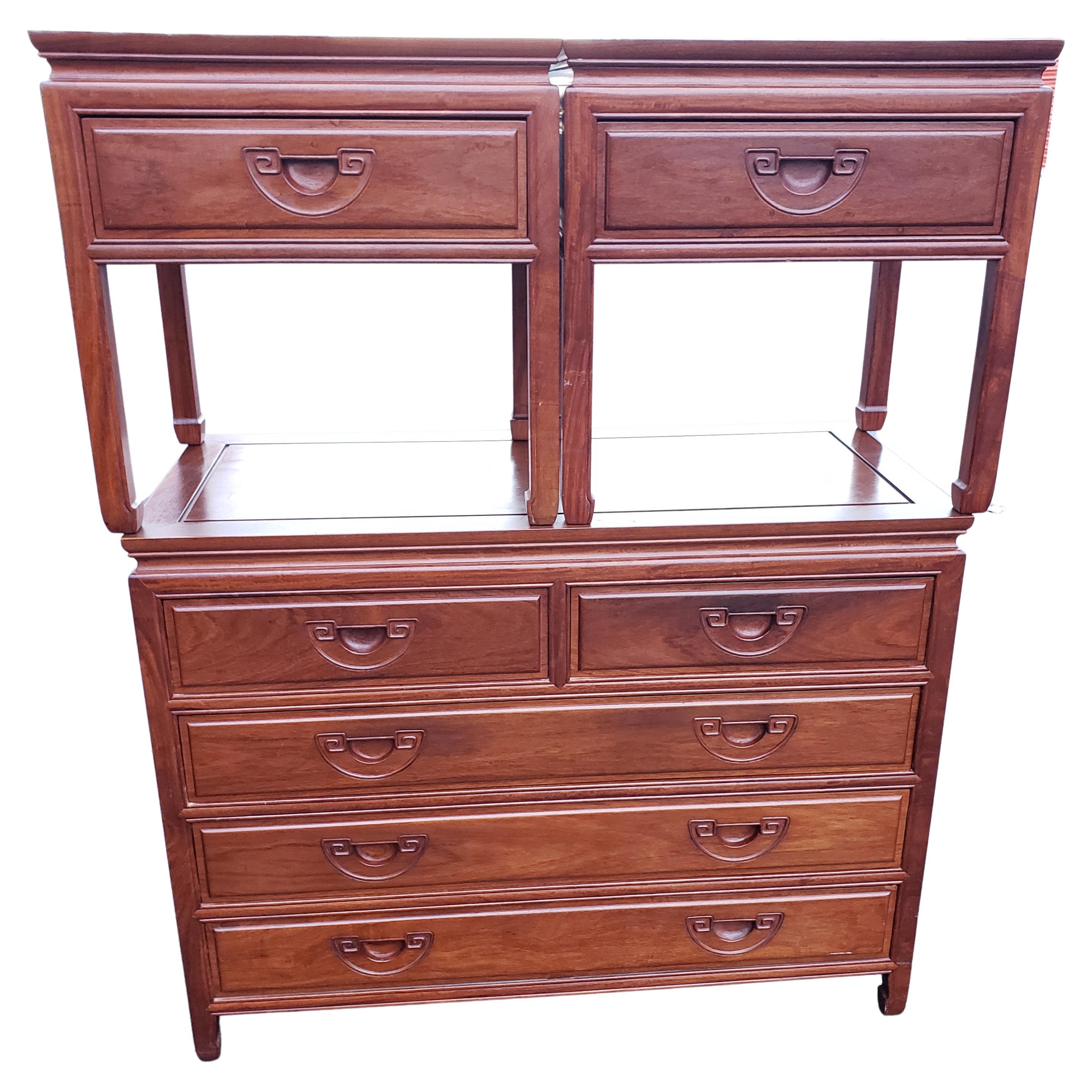 George Zee rosewood hand crafted commode / dresser / chest of drawers and side tables with integrated carved handles. Very good condition. All dovetailed drawers. Finished on all sides, inside out. 
Measurements: chest of drawers 42
