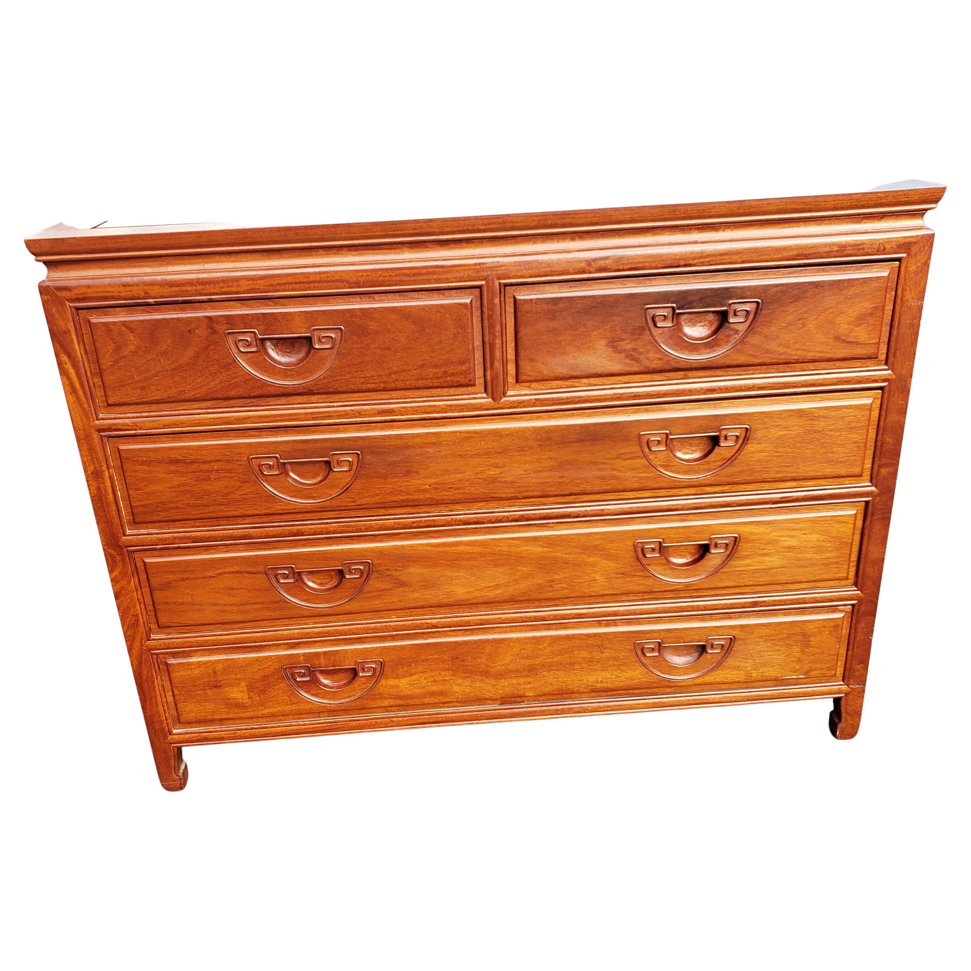 George Zee rosewood hand crafted commode / dresser / chest of drawers with integrated carved handles. Very good condition. All dovetailed drawers. Finished on all sides, inside out. 
Whse Kiki temp.

 