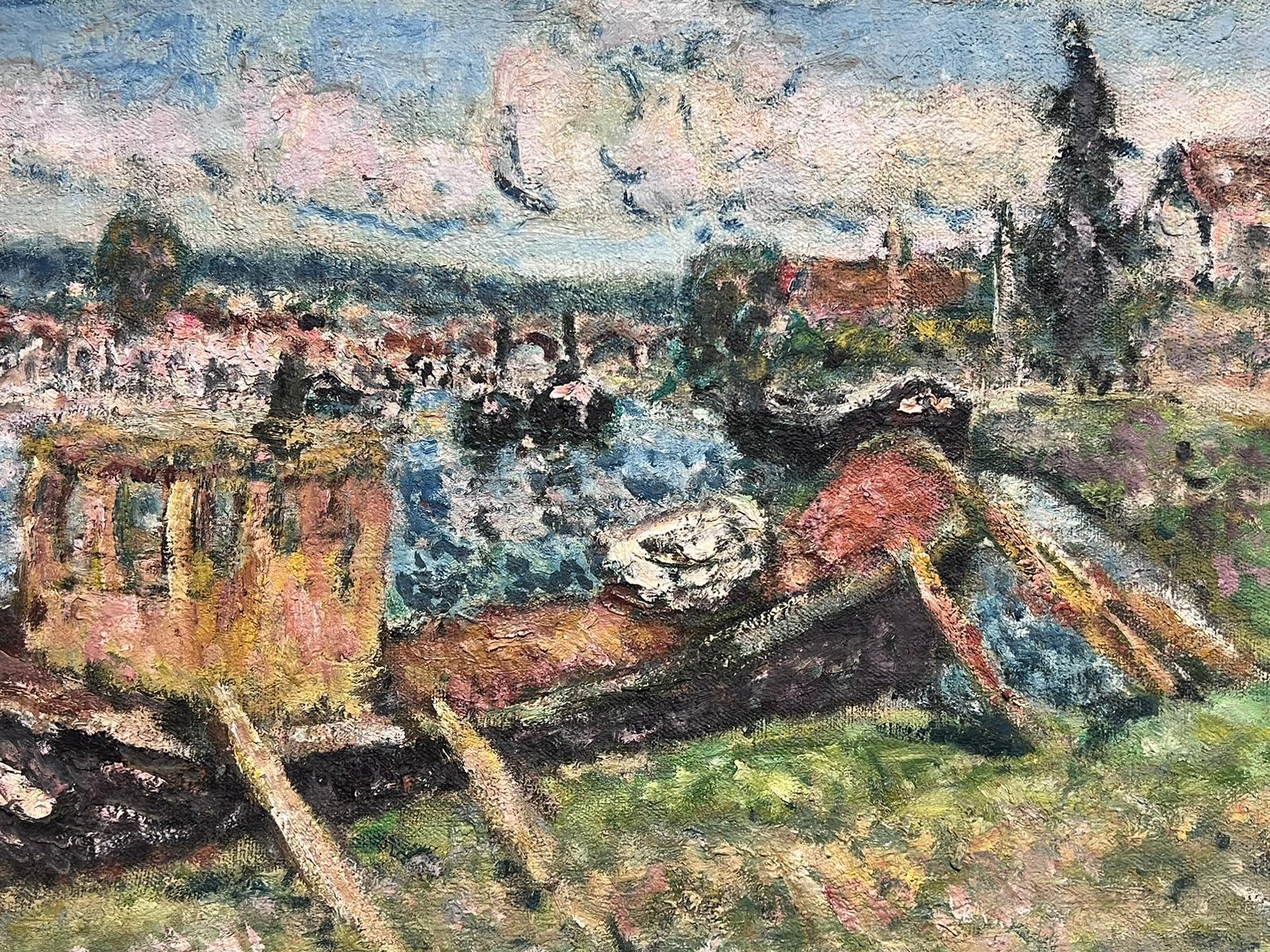 Boats on the Riverbank
by Georges Bousquait (French post-impressionist, 20th century)
signed oil on canvas, unframed 
canvas: 18.5 x 22 inches
inscribed verso
provenance: private collection, France
condition: very good and sound condition