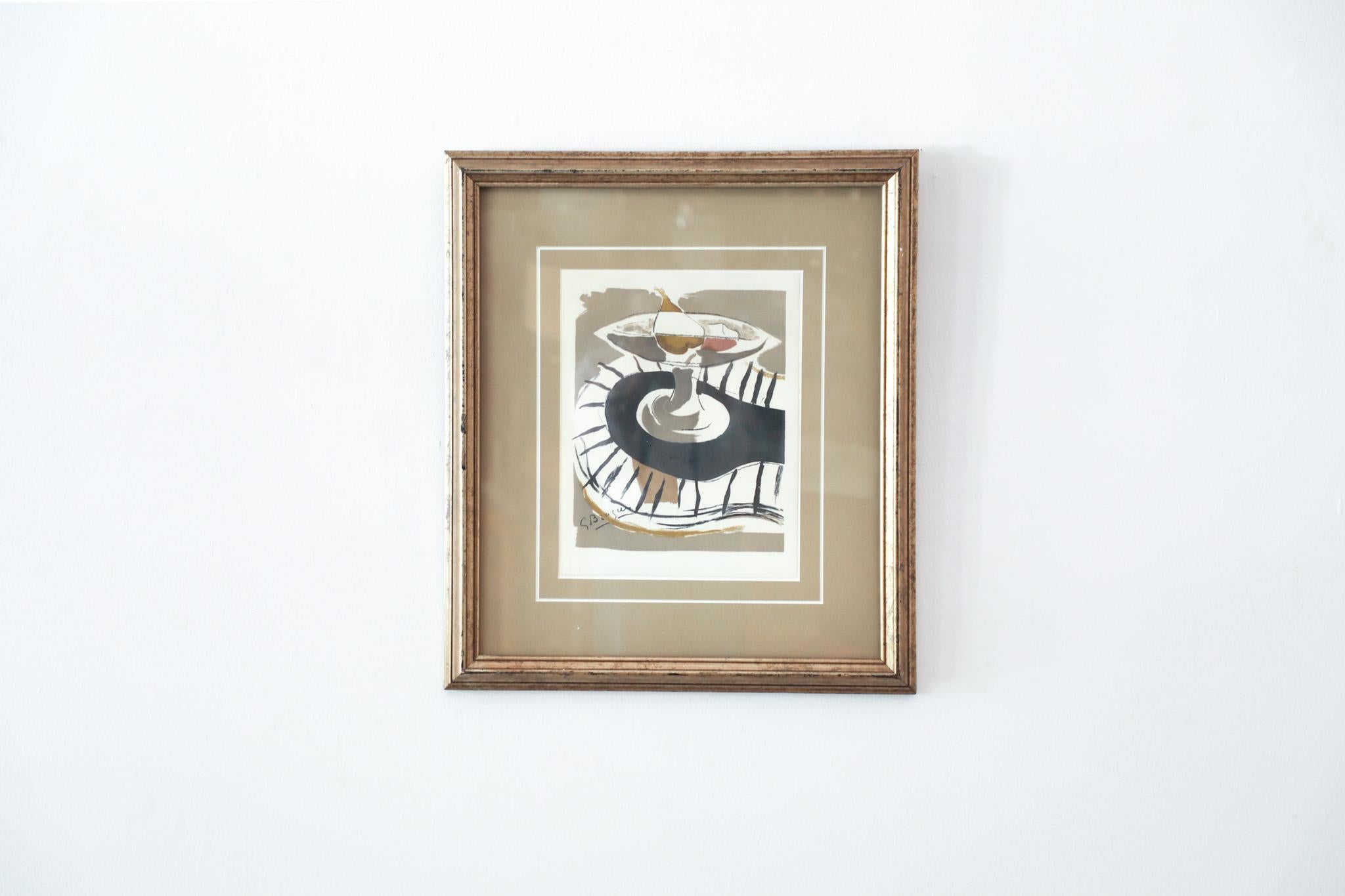 Mid-Century Georges Braque 'Le Compote' lithograph is an abstract still life depiction of a pear in compote. Braque is known as one of the pioneers of cubism along with Pablo Picasso This fine example shows his versatility and elegance with an eye