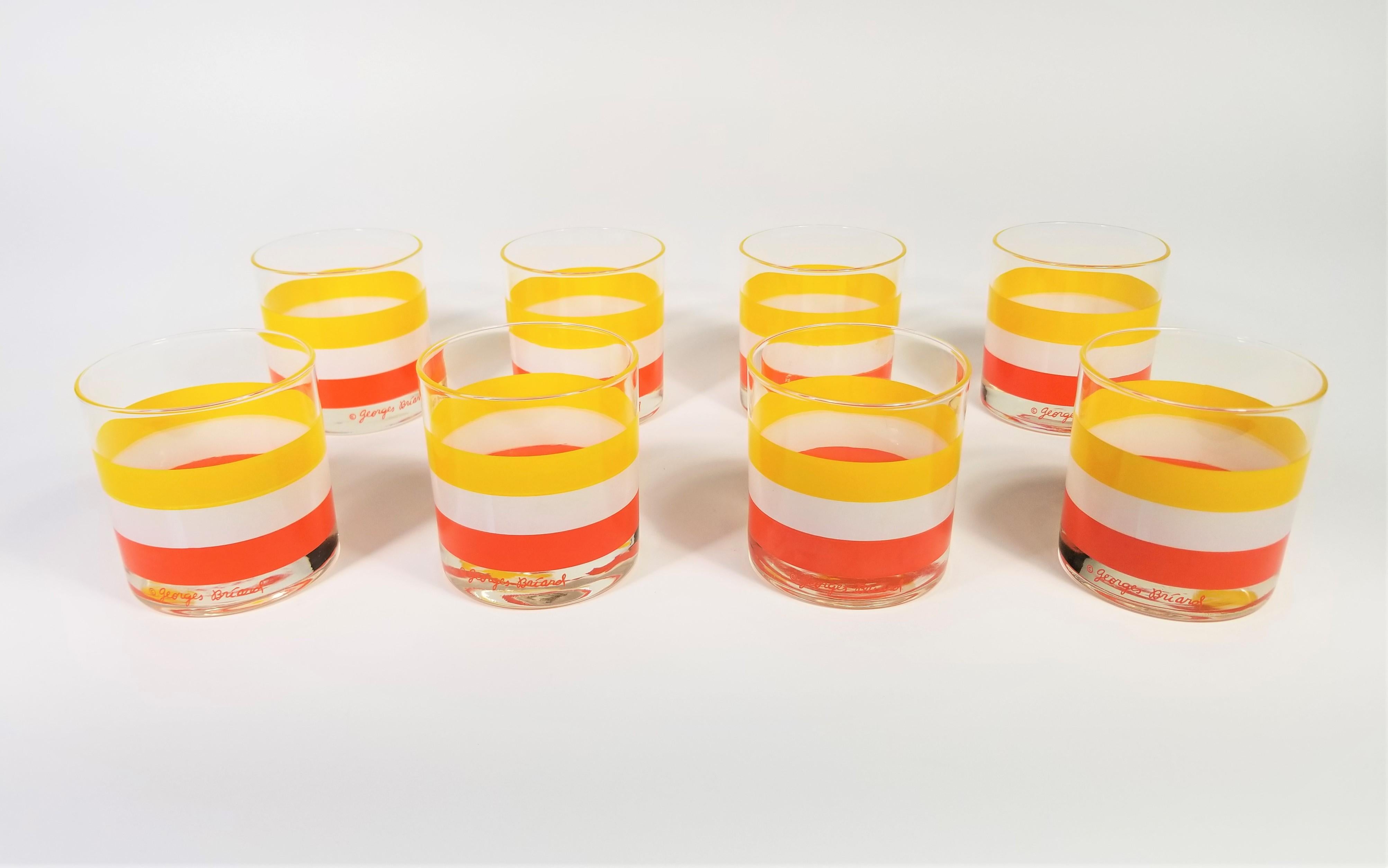 Mid Century Georges Briard Glassware Barware. Orange, Yellow, and White Stripe. Set of 8. All glasses are signed and in Excellent Condition.