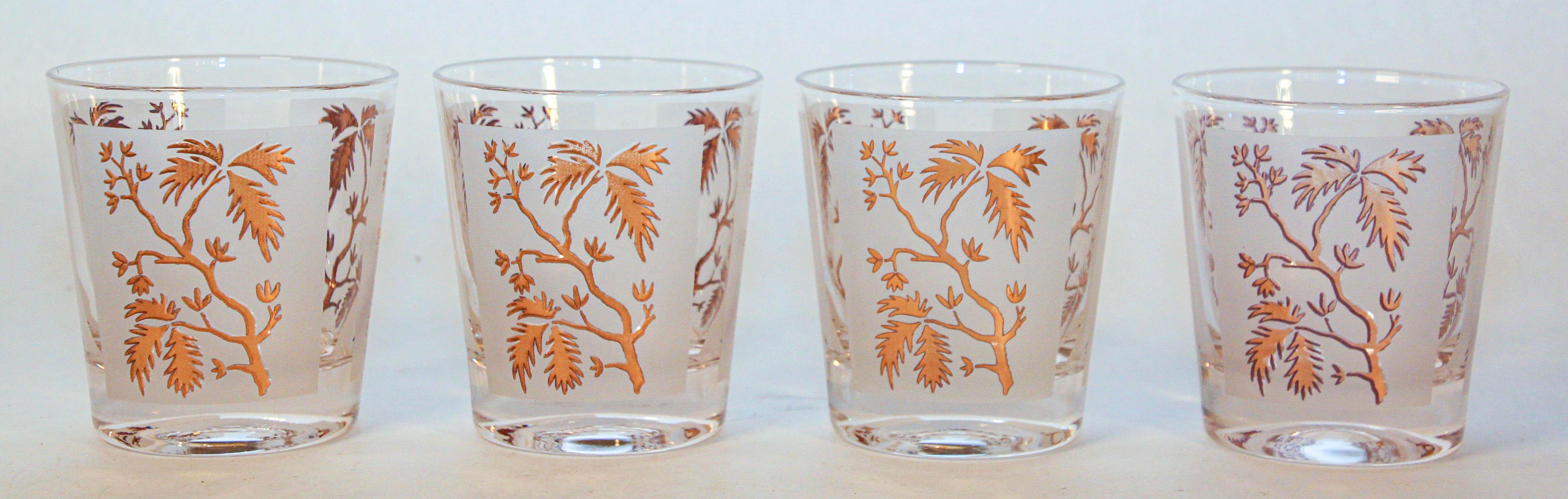 Georges Briard Gold Leaf Old Fashioned Frosted Cocktail Glasses.
Set of 4 Mid Century Modern old fashioned glasses designed by Georges Briard and feature a gold leaf Japanese style tree design.
The tree design is the repeating 3 times with the same