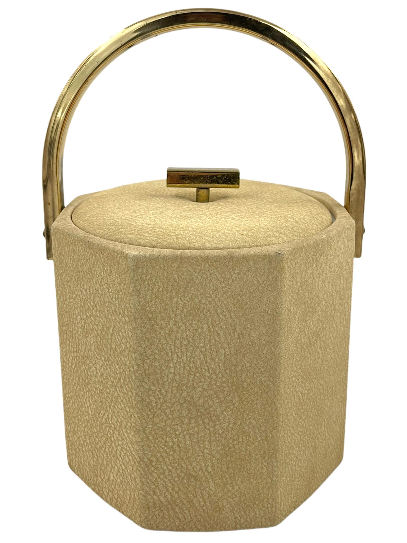 Georges Briard modern lidded ice bucket with brass handle and knob, marked 'Georges Briard USA' on the bottom. A chic 1970s modern stamped suede and brass ice bucket or wine/Champagne cooler by designer Georges Briard, circa 1970s. Piece bears