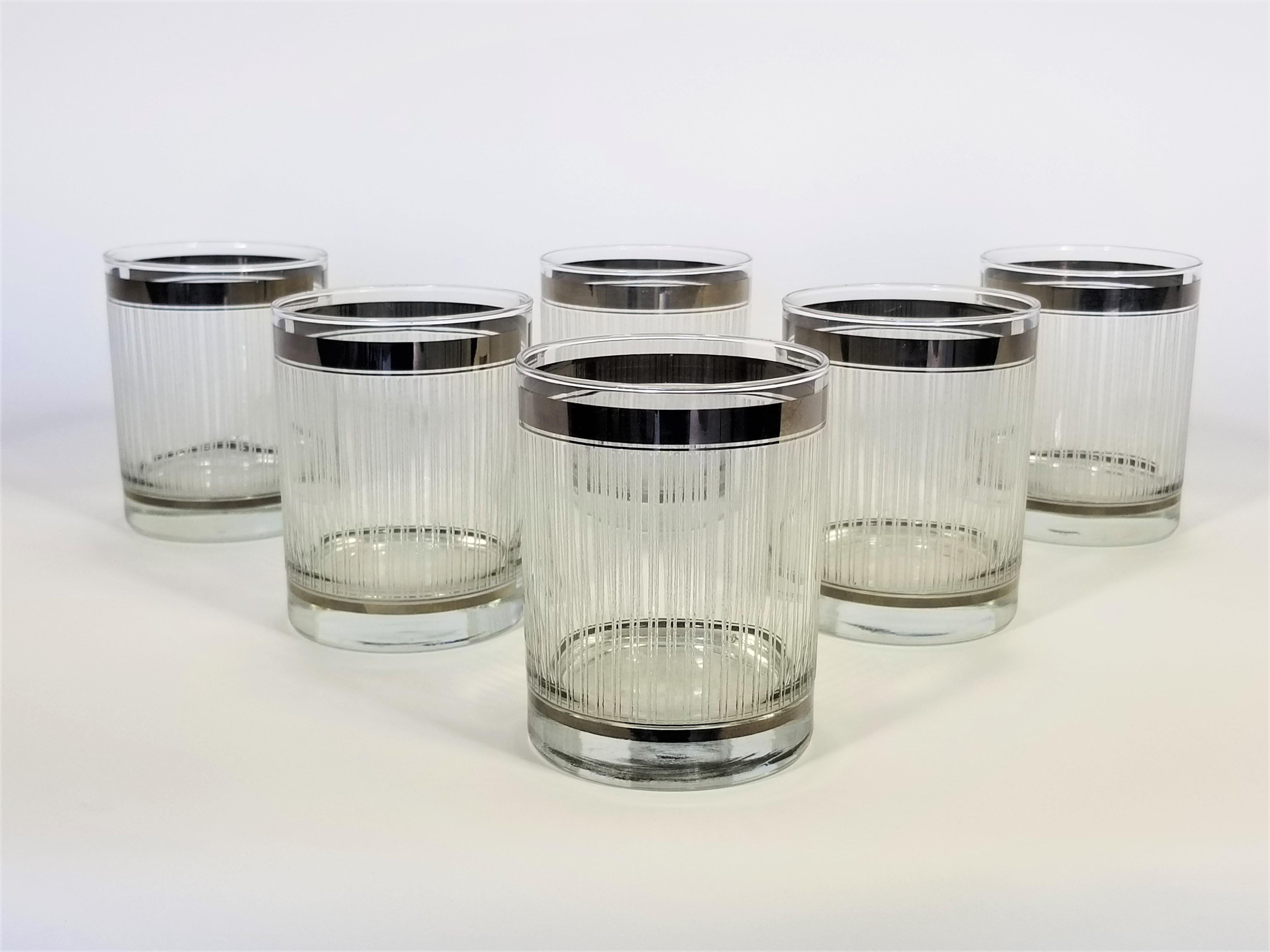 Stunning set of 6 midcentury Georges Briard glasses. Silver trim on top and bottom attributed to Dorothy Thorpe. All glasses are signed. Perfect cocktail size to fit well in your hand. Beautiful addition to any bar. Excellent condition.