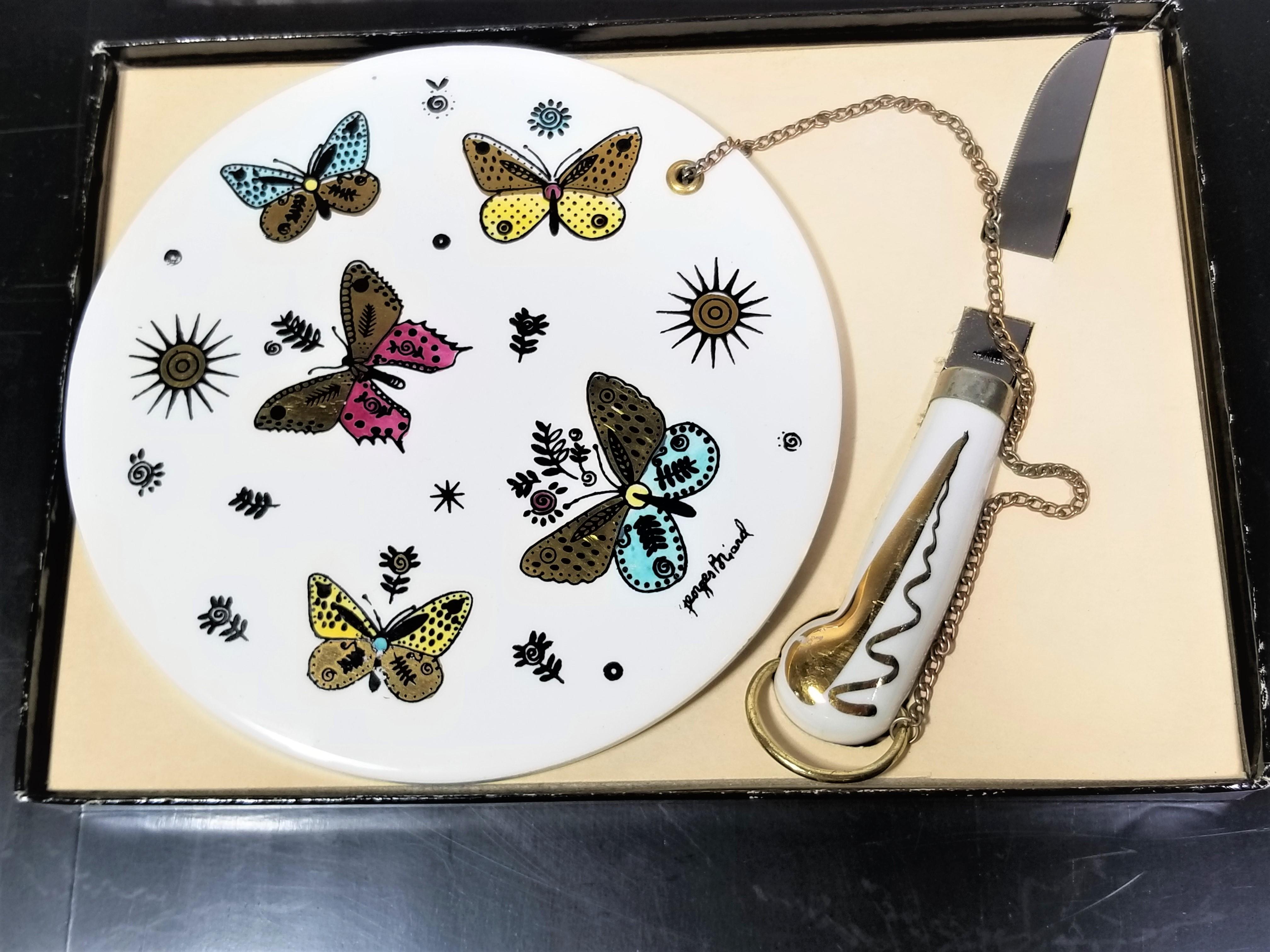 Rare mid century 1960s signed Georges Briard cheese serving plate or platter with Knife. Ceramic plate with gold gilded accents and colorful butterfly motif. Knife is attached to plate with a gold chain. Never used and still in Original George