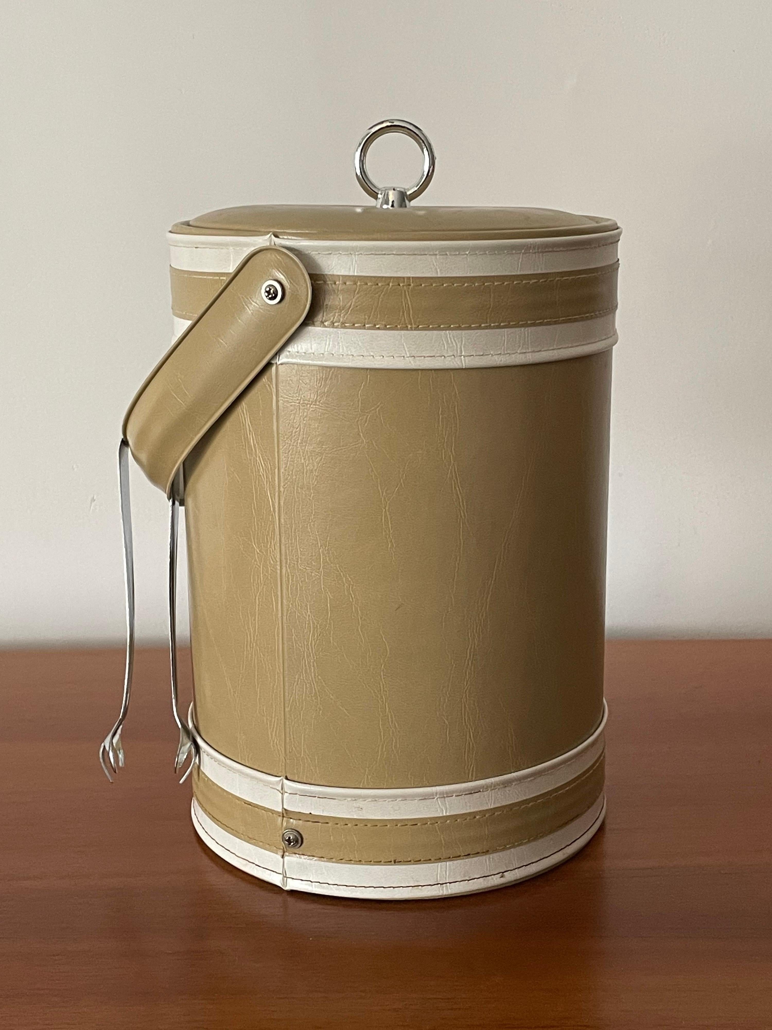 Unique faux leather ice bucket by Georges Briard. Very good original condition and ready for use.