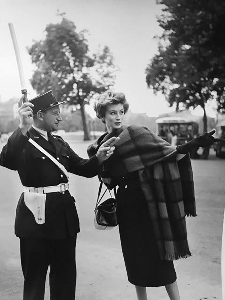 Georges Dambier Black and White Photograph - Suzy & the Police Man