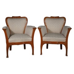 Georges de Feure pair of armchairs, 1900 Expo model, in hand sculpted pearwood.
