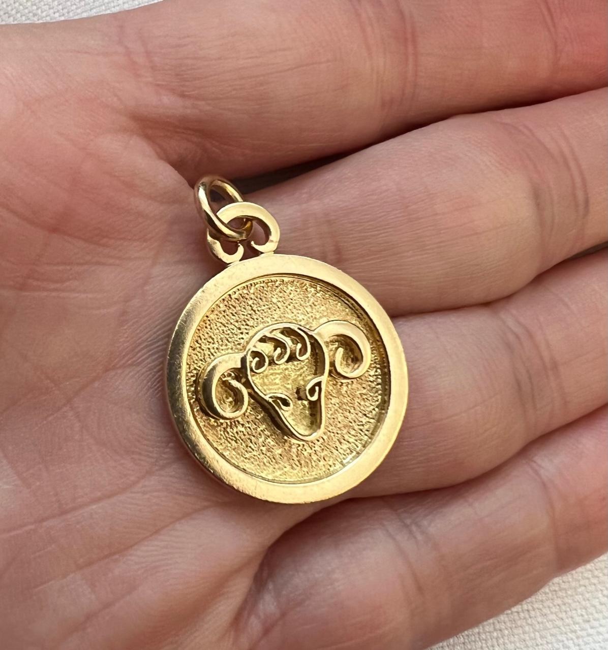 A vintage, 18 karat yellow gold Aries zodiac pendant, by Georges Delrue, c. 1970. Signed by the artist, stamped 18k. 

French-born Georges Delrue (1920 – 2010) was a pioneer of  the modernist jewelry movement in Canada, and was celebrated for his