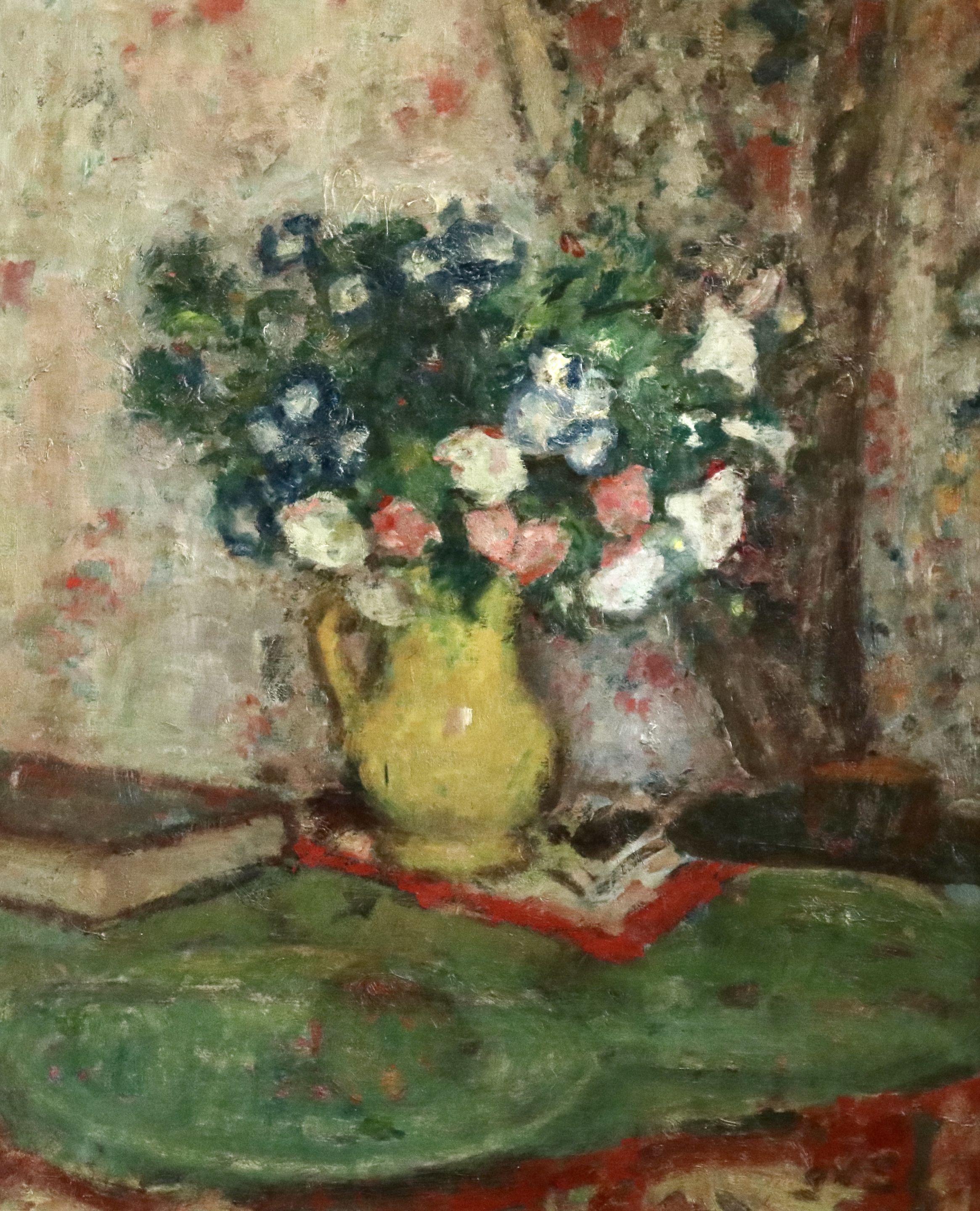 Wonderful still life painting by Georges D'Espagnat of flowers in a yellow jug on a table beside a book. Oil on canvas circa 1930. Signed lower right. Framed dimensions are 32 inches high by 28 inches wide.

From the beginning of his career it was a