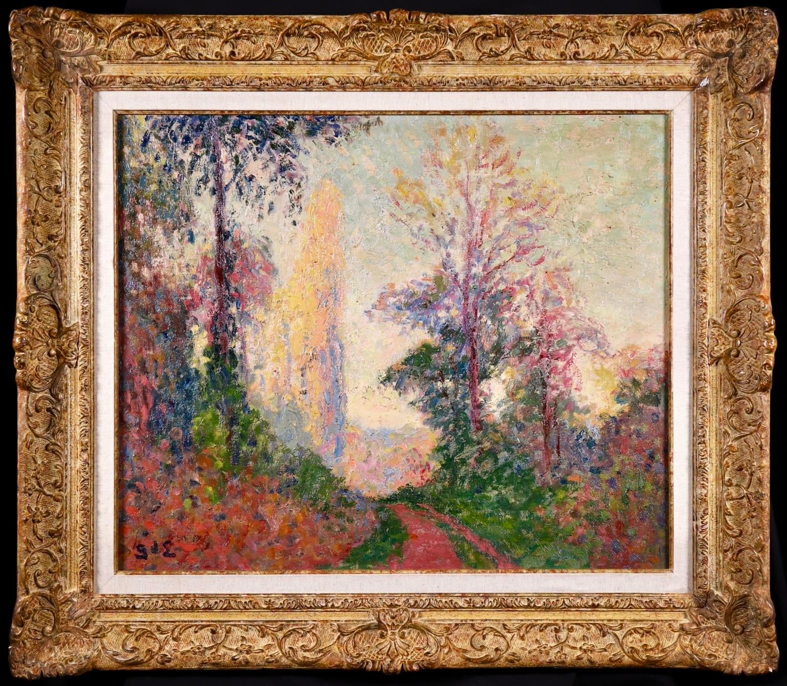 A stunning oil on canvas by French post impressionist painter Georges D'Espagnat depicting a tree-lined path. The colours of the leaves are changing from green to red as the season moved from summer to autumn and the distant trees glow in the low