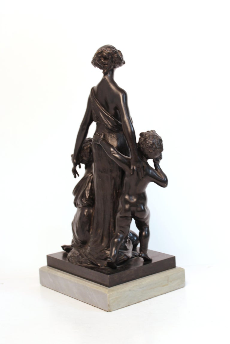 Sculpture en bronze « Mutualite » de Georges Flamand de style Art Nouveau  sur socle en marbre sur 1stDibs