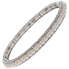 Georges Fouquet Bracelet jonc en platine avec perles et diamants, Paris