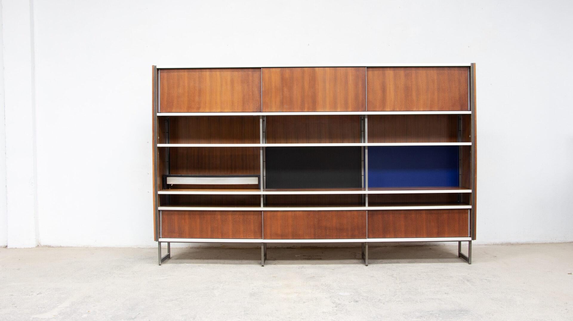 Georges Frydman bookcase for EFA
Modular walnut bookcase from the 1960s by designer Georges Frydman, published by EFA.
Georges Frydman won the René Gabriel prize in 1966.

Set of 5 shelves. Not widely available in low height (170 cm). Modularity is