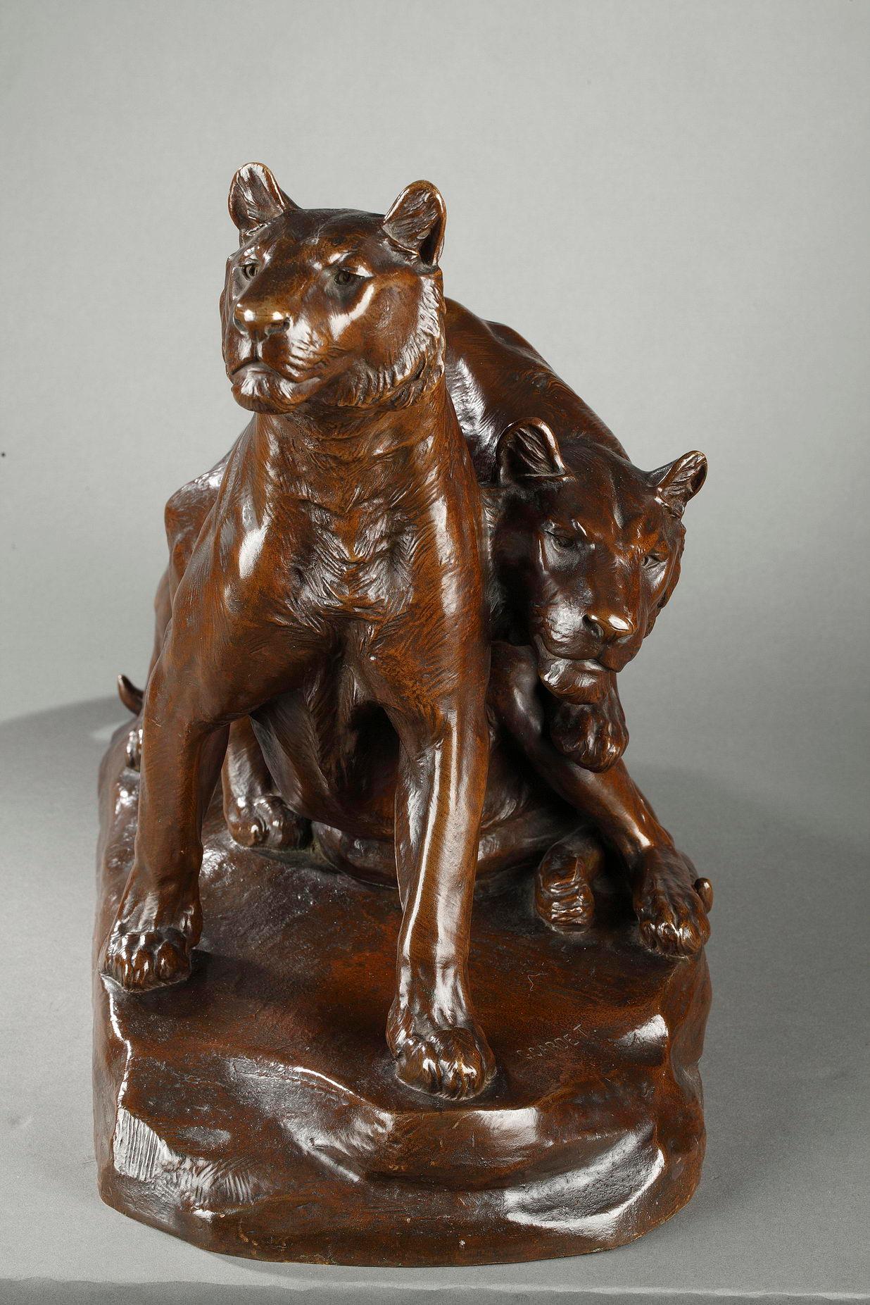 Georges Gardet (1863-1939)
Due giovani leoni

Gruppo in bronzo con una patina marrone scuro sfumata
Firmato sulla base 
