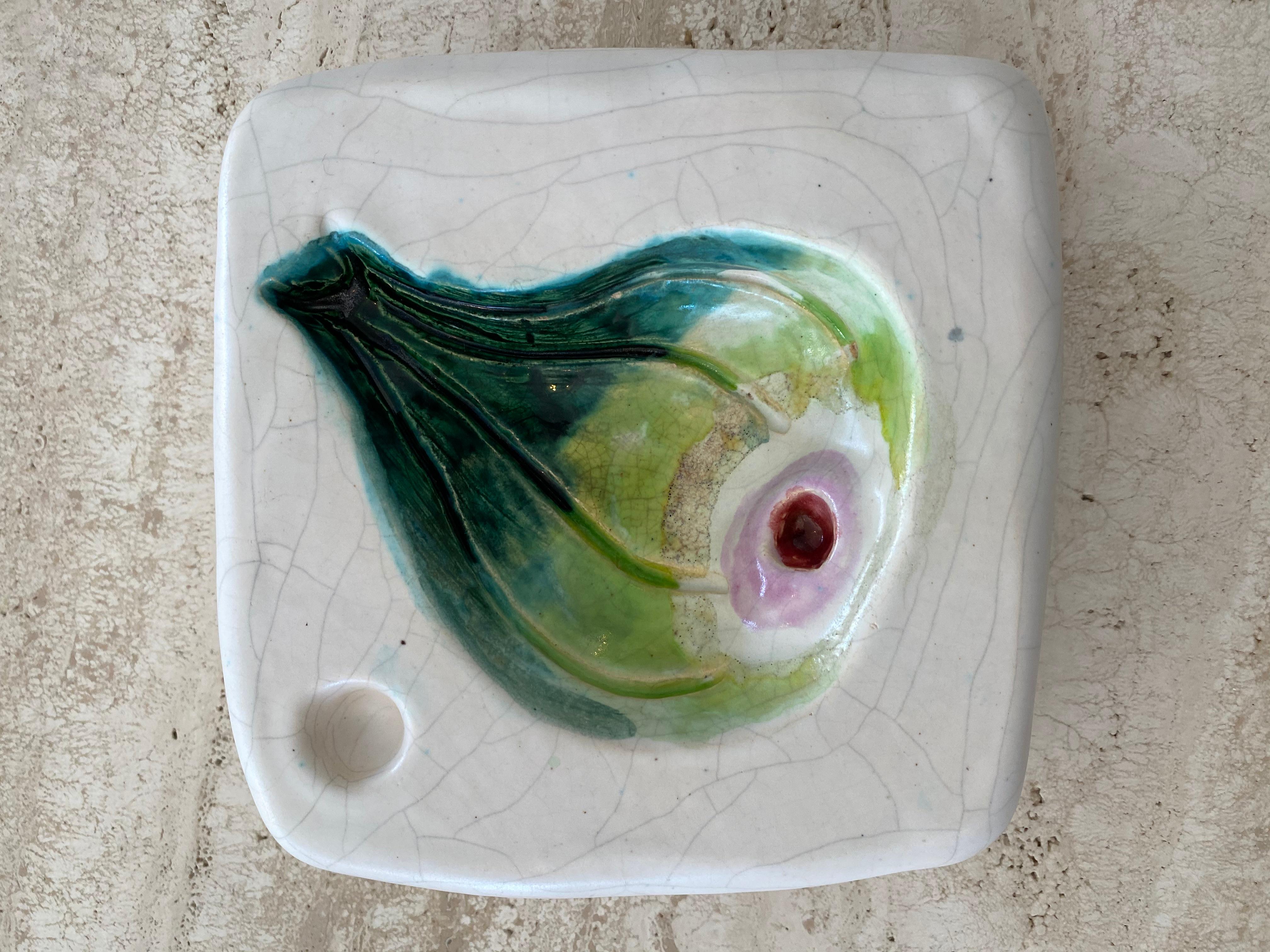 French master ceramic artist Georges Jouve ceramic cendrier ashtray or vide poche with image of a fig. Part of a series of fig, pear, apple and pomegranite. 
Signed Jouve and with his famous monogram plus this one was made for Saks Fifth Ave and