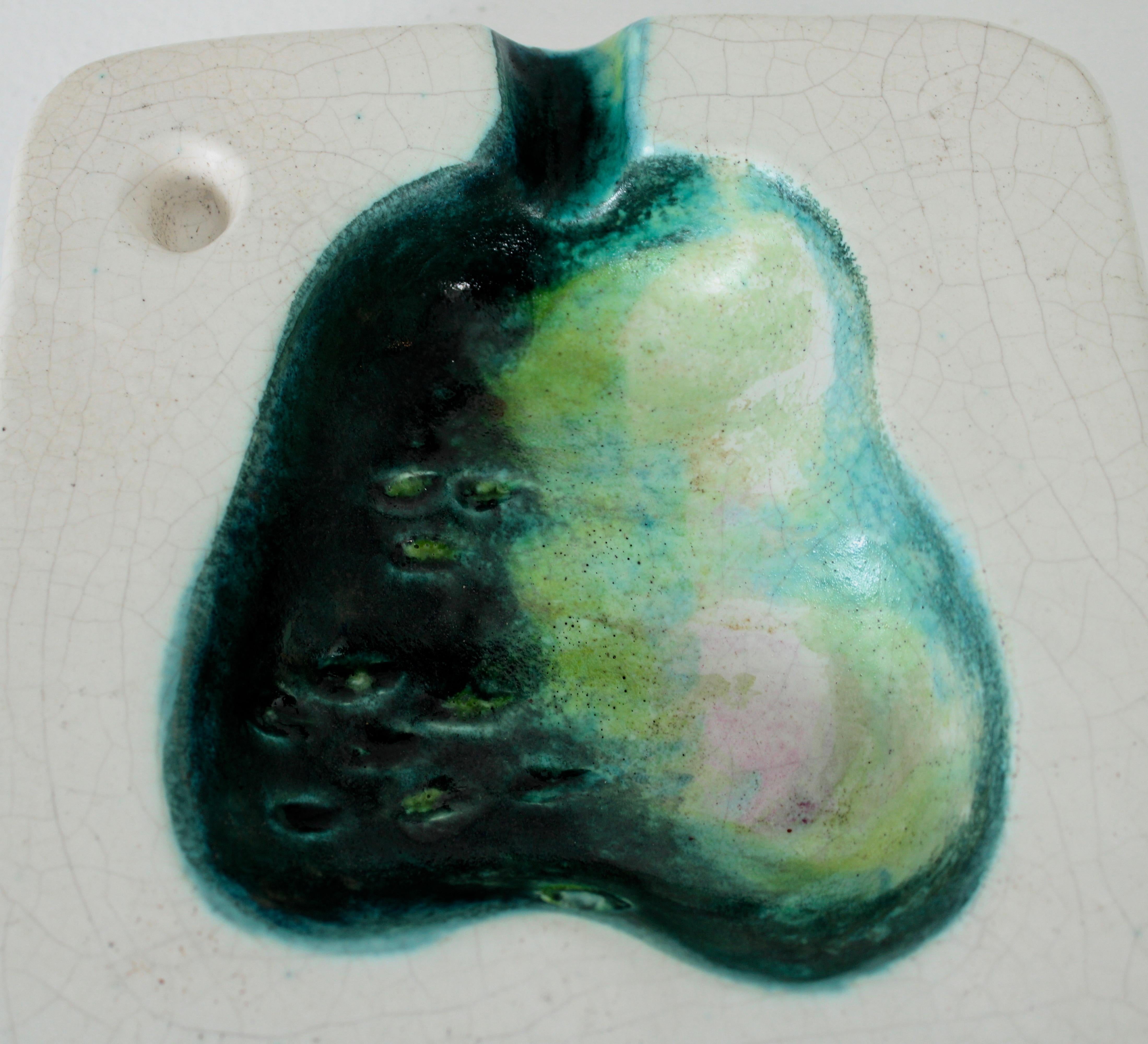 French master ceramic artist Georges Jouve ceramic cendrier ashtray or vide poche with image of a pear.
Signed Jouve and with his famous monogram.
Excellent condition, vibrant greens and beautiful complex white glaze with touch of blush coming