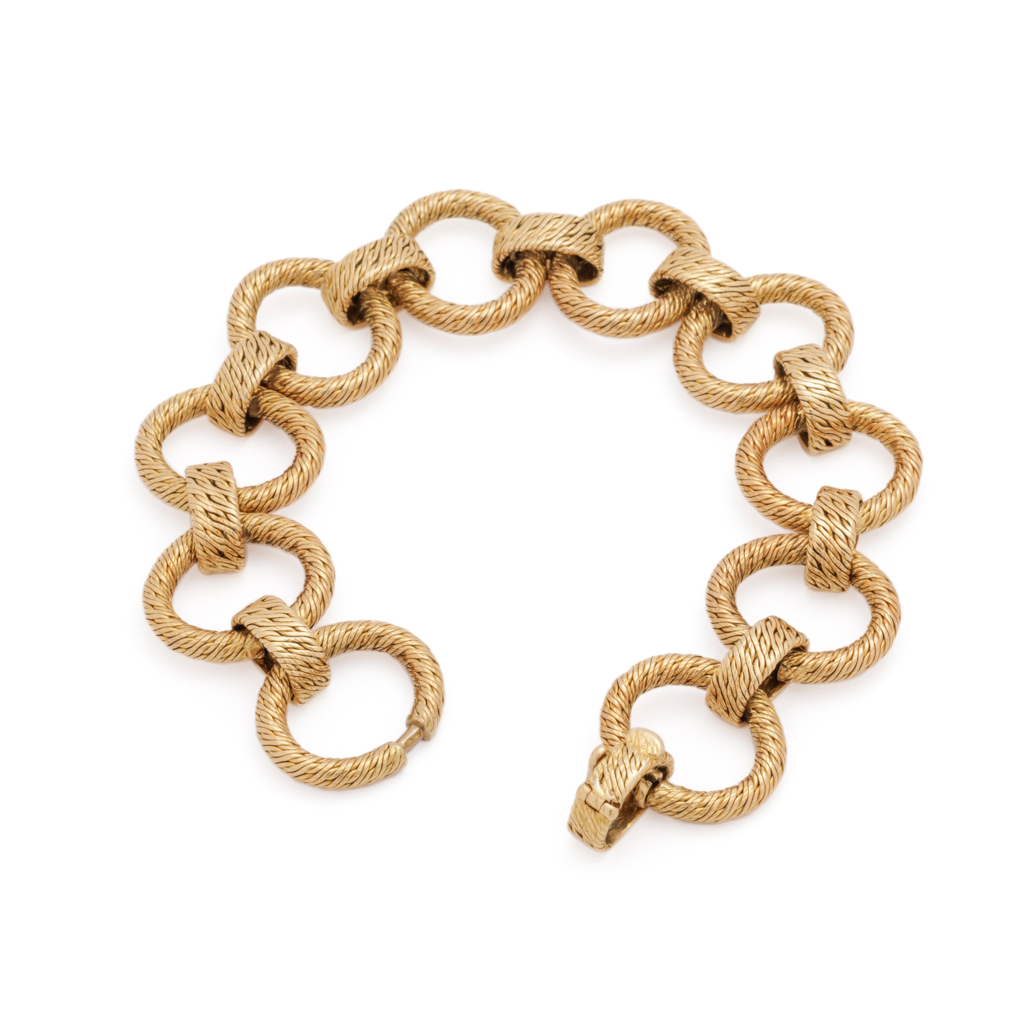 Georges Lenfant 18 Karat Woven Circles Bracelet

55 grams
7.5 inches length
0.90