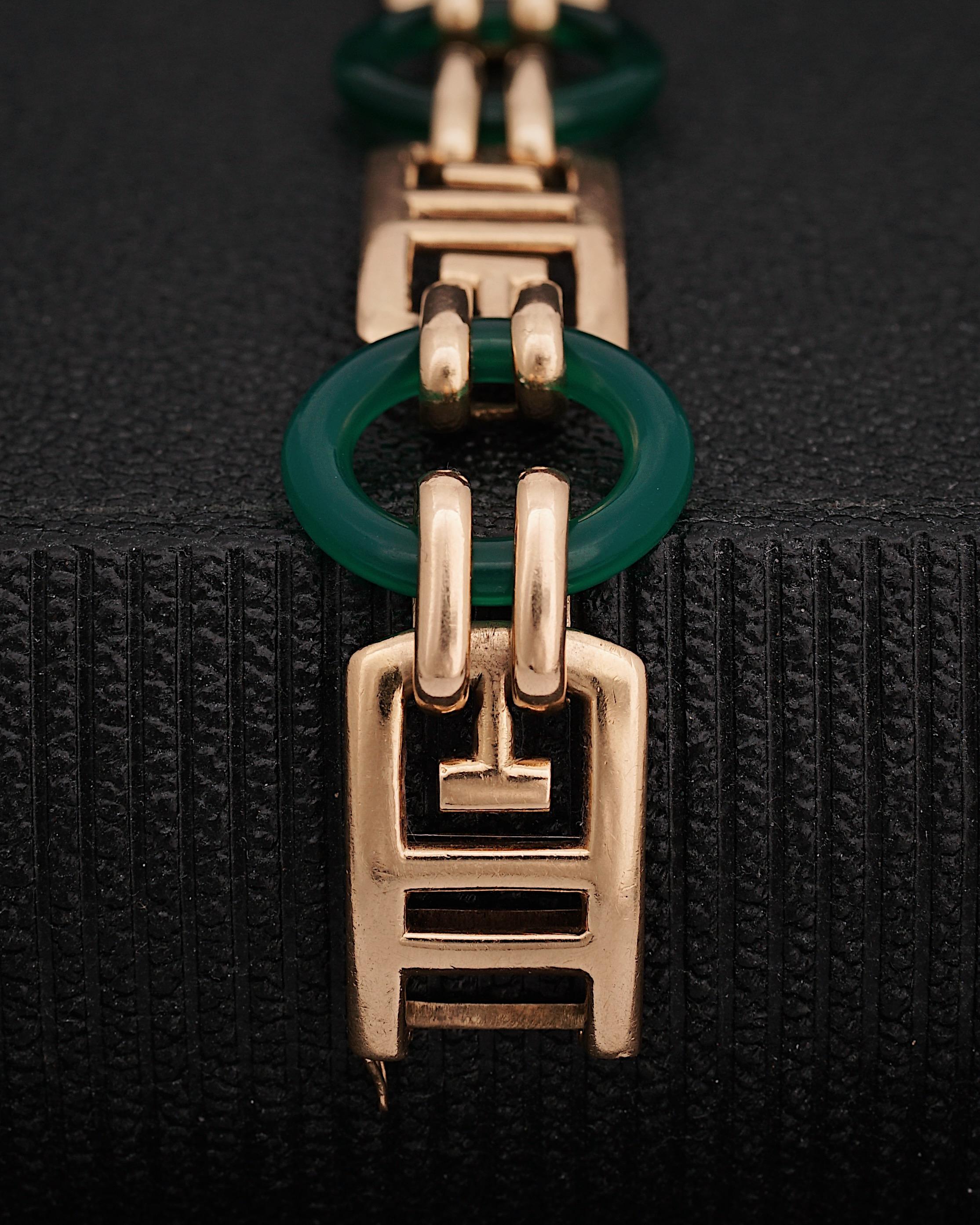 Georges Lenfant
Rare Art Deco 18k Gold & Chrysoprase Link Bracelet, Late 1930s
Wears the Georges Lenfant maker's mark. Numbered 422
Weight : 47 grams
Beautiful Condition.

This is a rare and timeless collectible Item created by Georges Lenfant,