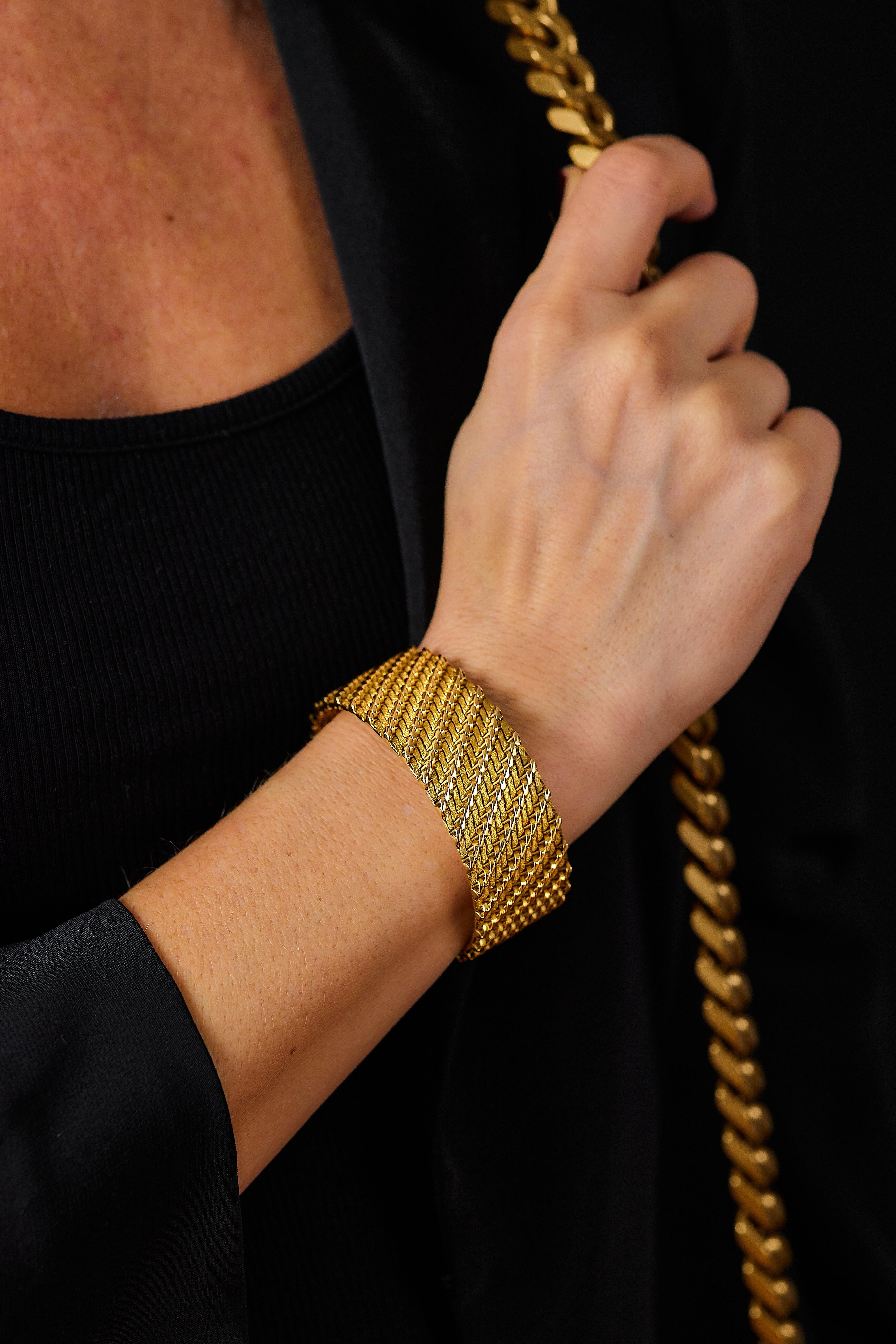 Bracelet by Georges Lenfant, Paris circa 1970

Milanese fabric bracelet in 18K (750/1000) yellow gold with guilloché pattern.

The bracelet fastens with a concealed clasp and safety catch 

The bracelet is in excellent condition

It is marked with