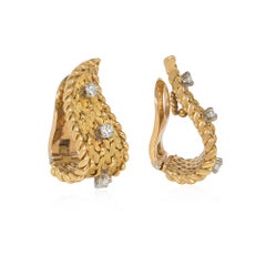 Georges Lenfant pour Gübelin Boucles d'oreilles flamme stylisée du milieu du siècle en or et diamants