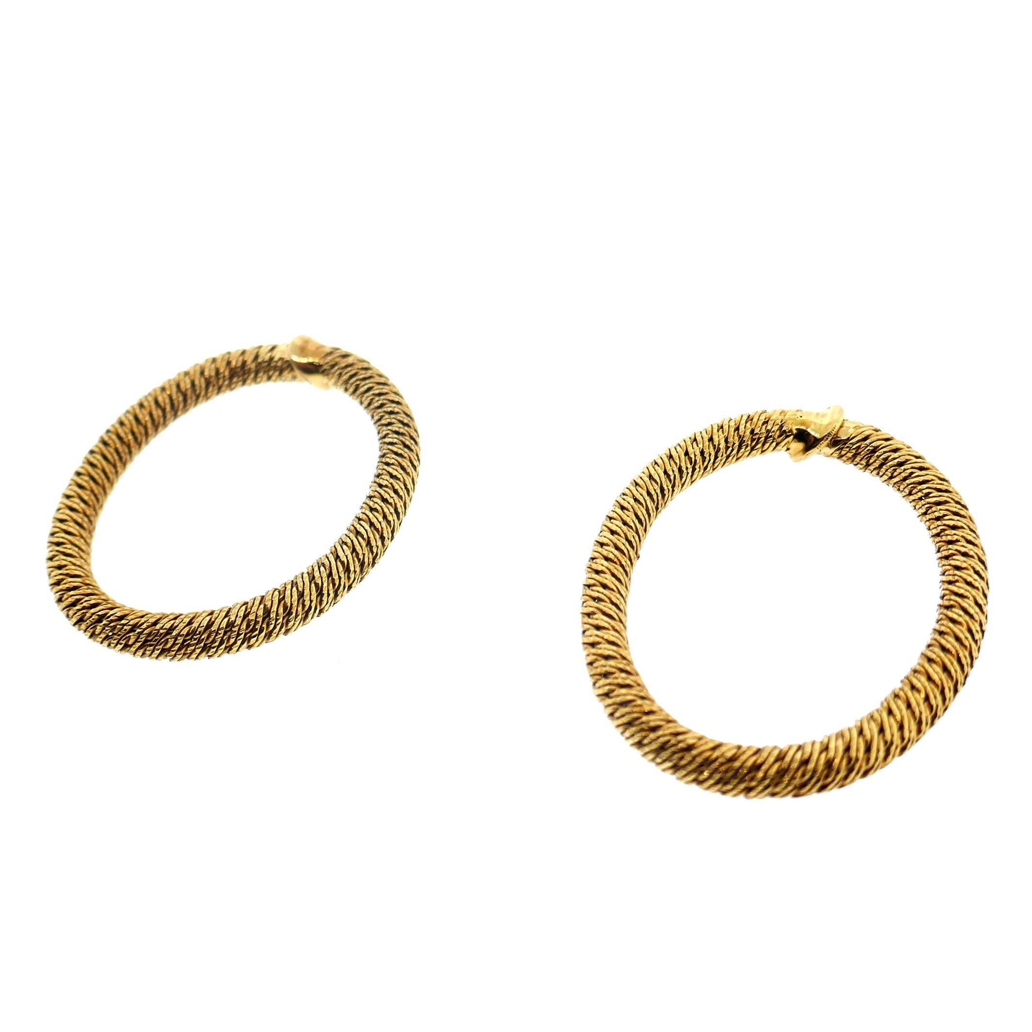 Georges L'Enfant French Yellow Gold Woven Textured Hoop Earrings

Here is your chance to get an extremely rare and exquisite pair of Georges L'Enfant earrings. They are comprised of 18K yellow gold in the iconic L'Enfant woven pattern, and feature