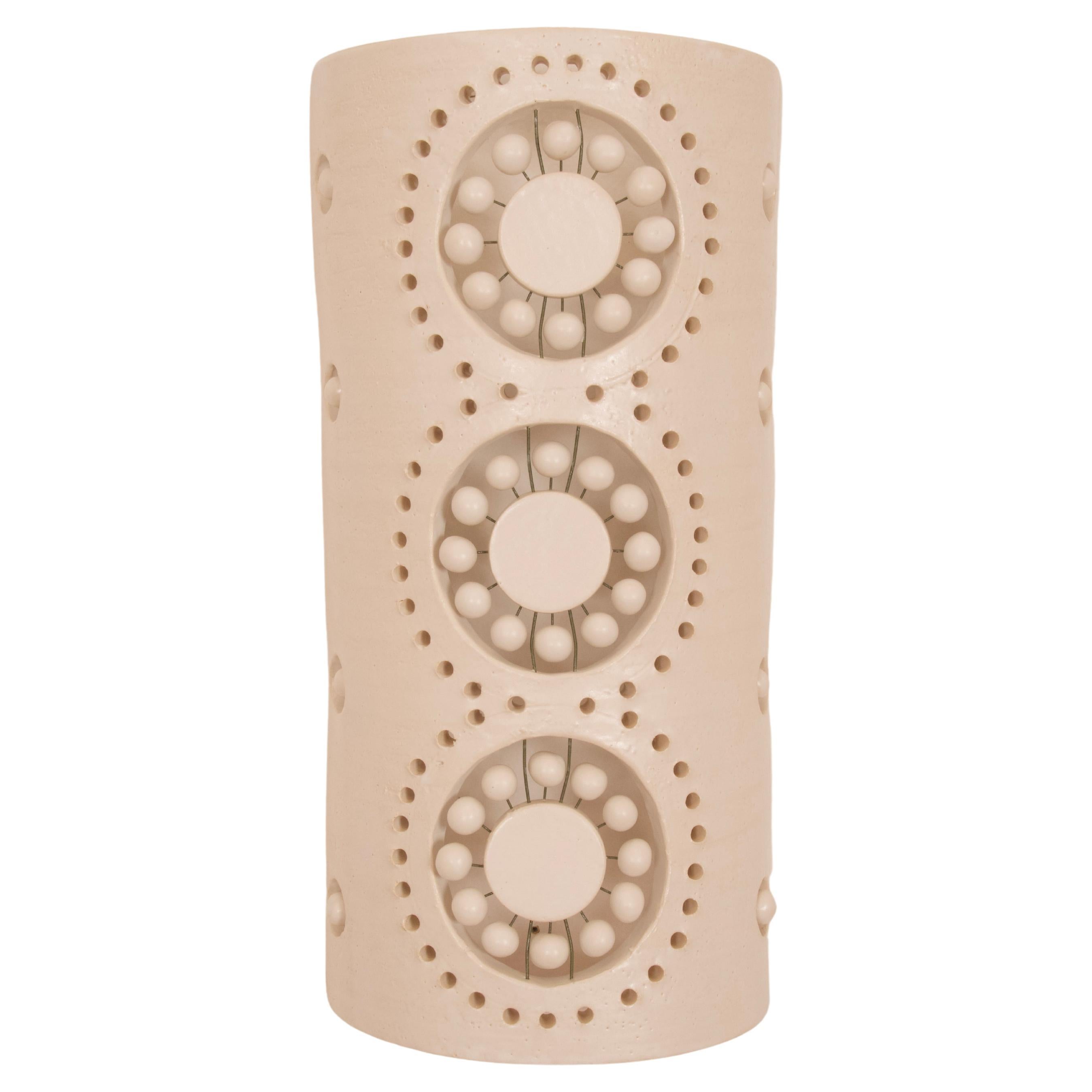Pair of 3 flowers sconces in white enamelled ceramic, as all the Georges Pelletier ceramics, this pair of sconces is bringing to your space an amazing light experience when the night falls, and a stunning sculptural presence during the day.