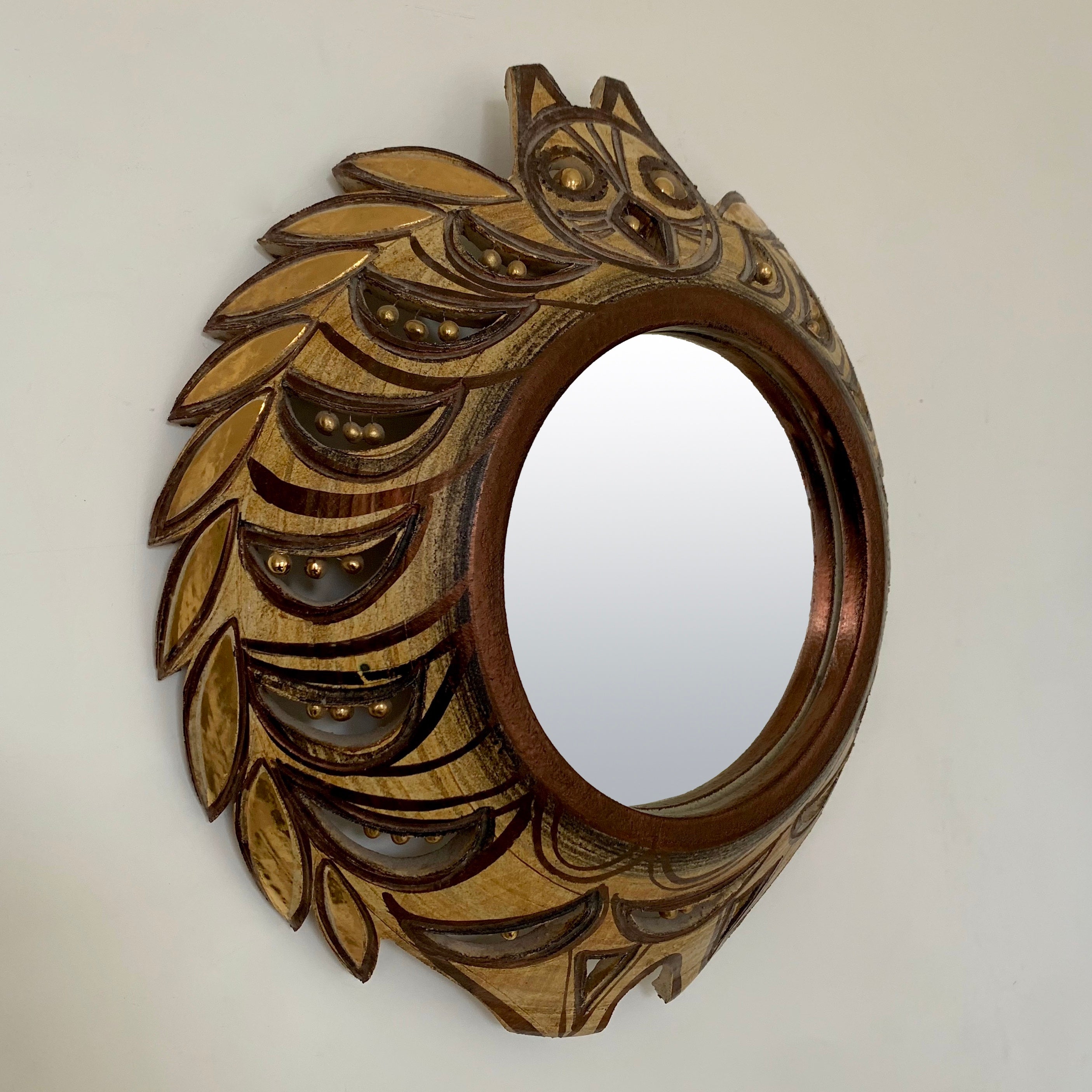 Rare and beautiful Georges Pelletier wall mirror, circa 1975, France.
Owl model with wide open wings, hand-painted and enameled ceramic. 
Brown, beige, gold and copper shades.
Dimensions: 49 cm H, 45 cm W, 13 cm D, diameter of the  central round